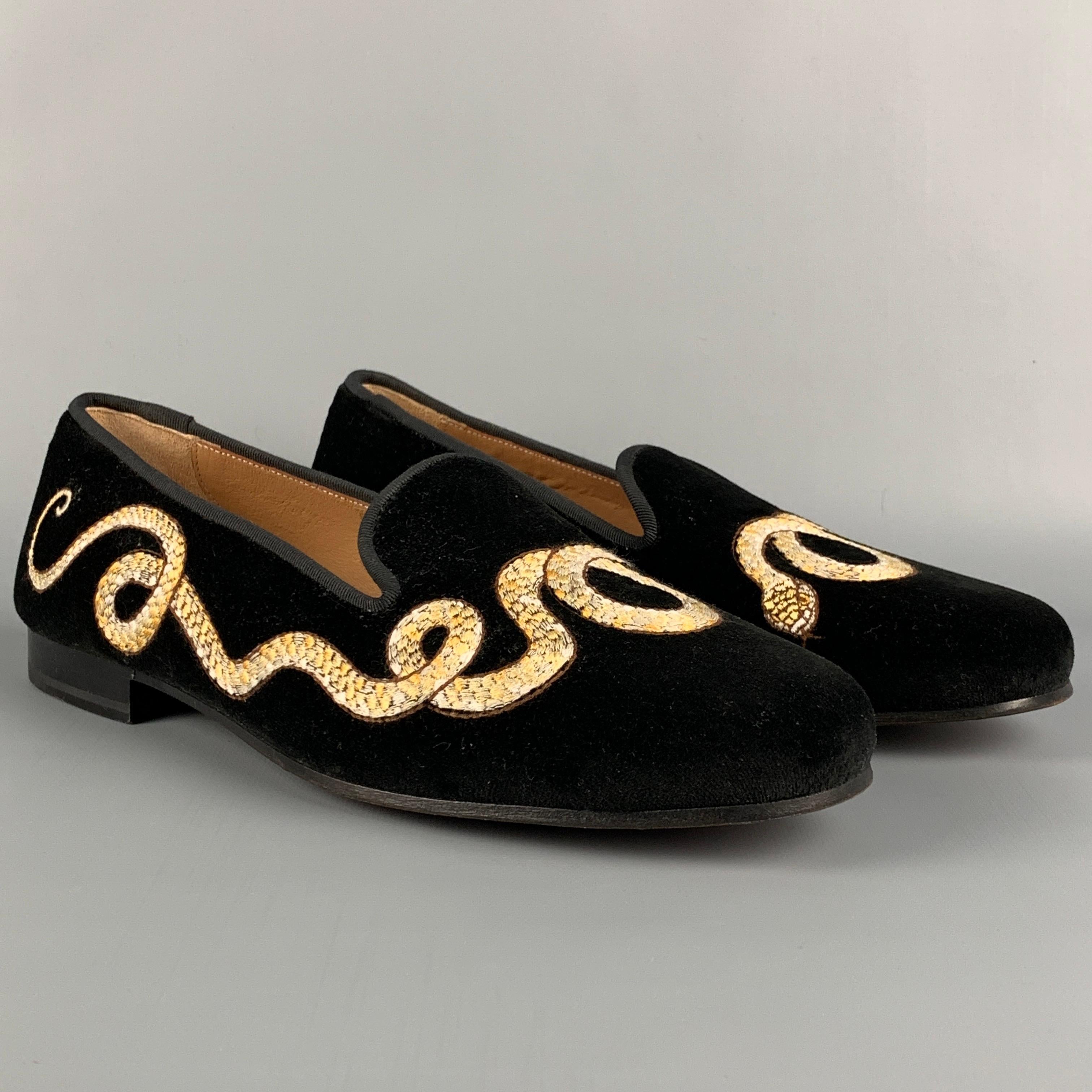 STUBBS & WOOTTON flats comes in a black velvet with a snake embroidered design featuring a slip on style and a leather sole. Made in Spain. 

Very Good Pre-Owned Condition.
Marked: 9

Outsole: 11 in. x 3.75 in. 