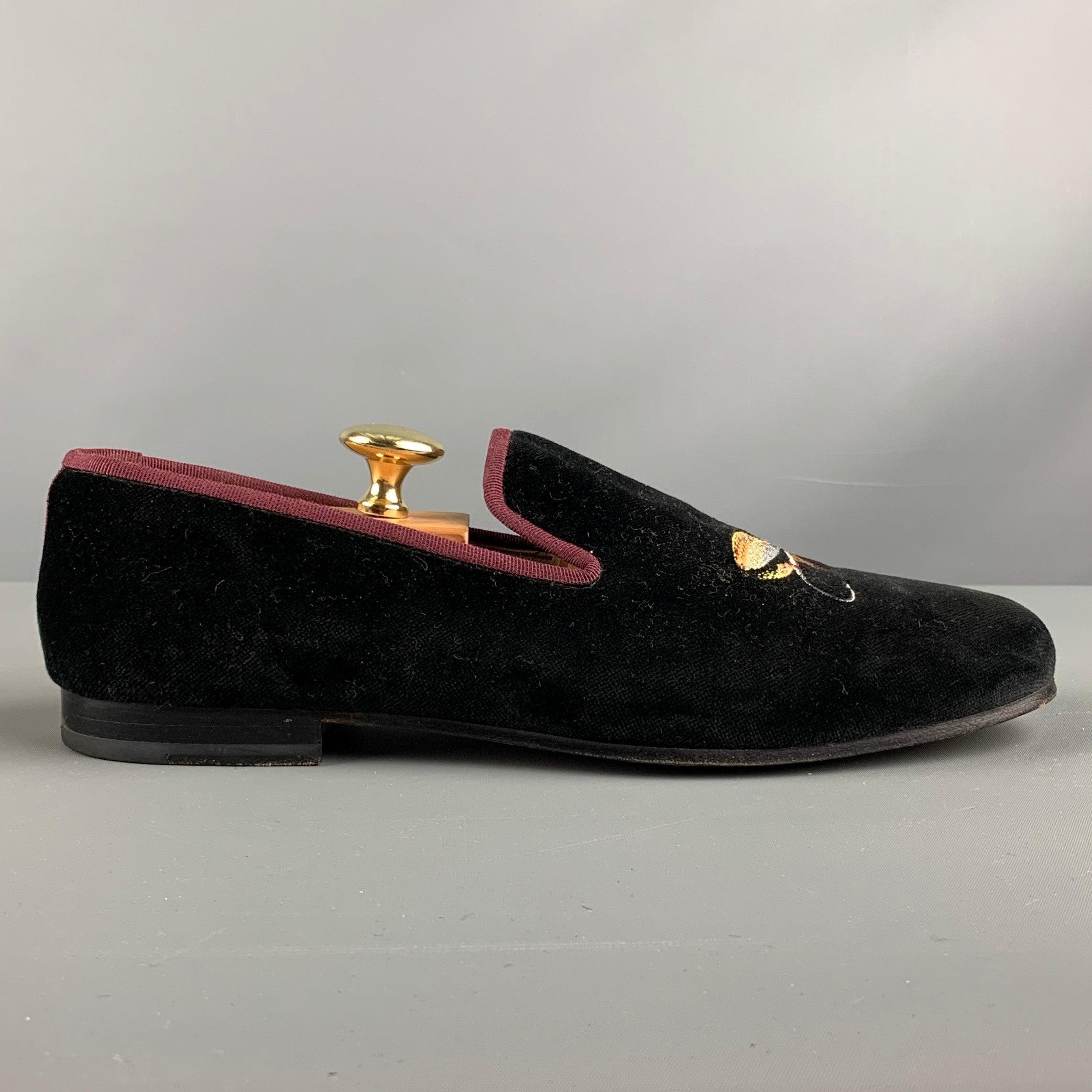 STUBBS & WOOTTON loafers comes in a black velvet featuring a slip on style, fish hook embroidered details, and a leather sole. Made in Spainches  Very Good Pre-Owned Condition. Signs of wear. 

Marked:   9 1/2Outsole: 11.25 inches  x 4 inches  
  
 