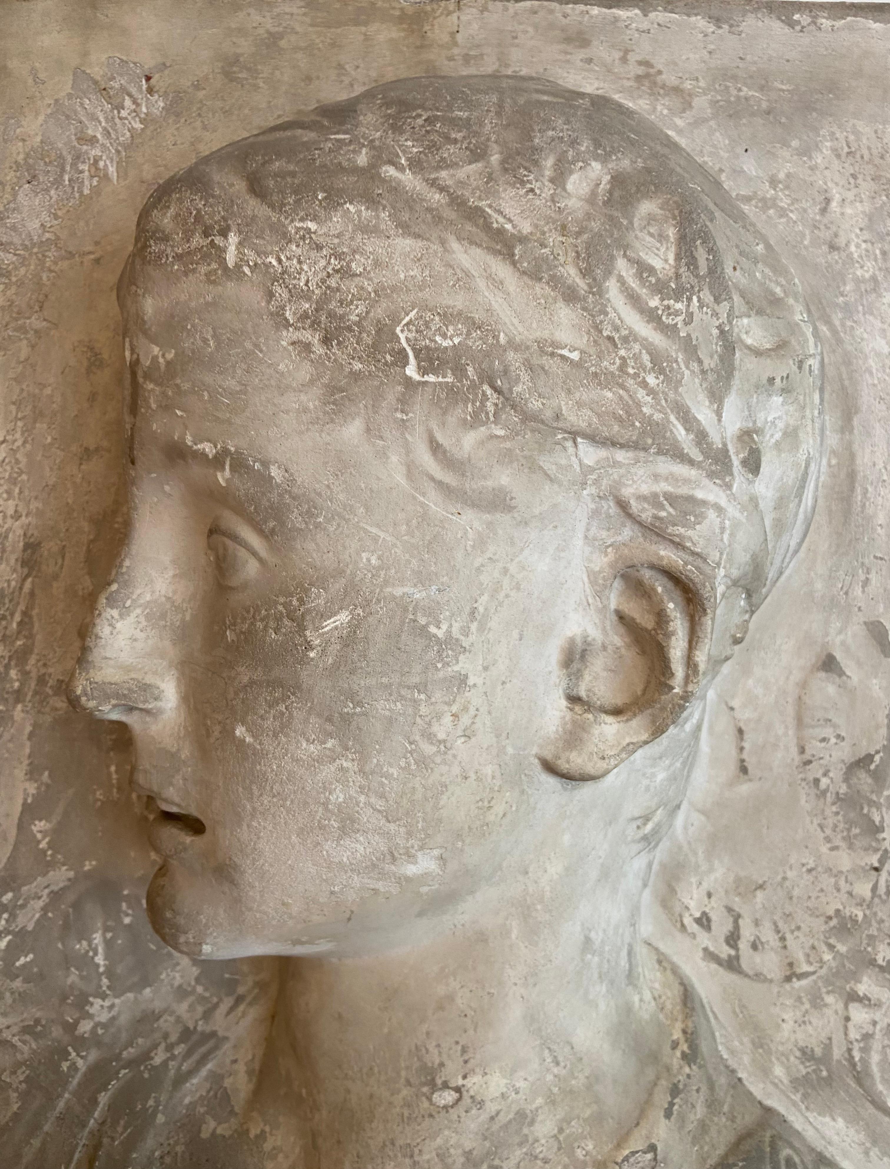 Stucco bust of a young roman emperor in relief. For Sale 1