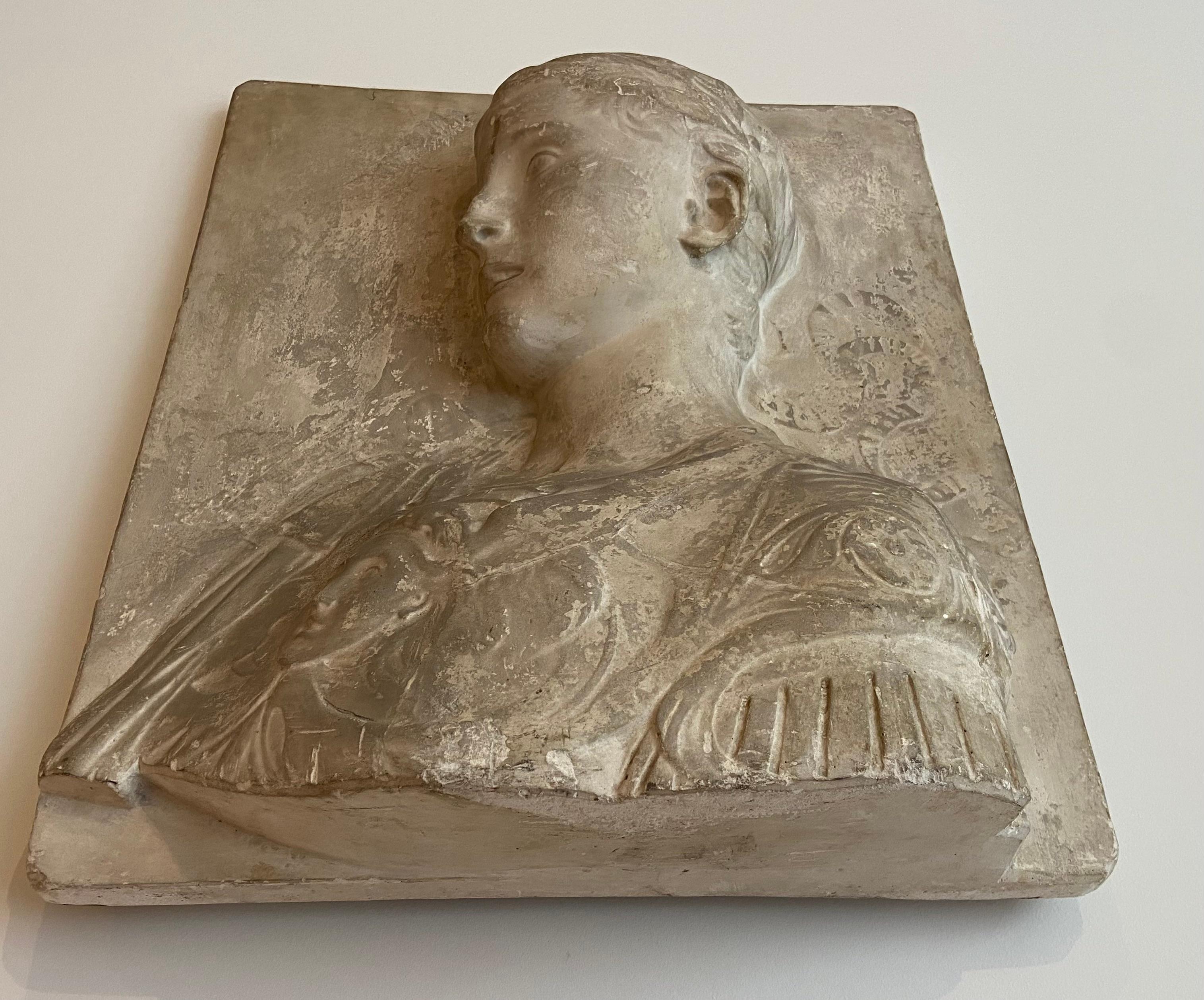 19th Century Stucco bust of a young roman emperor in relief. For Sale