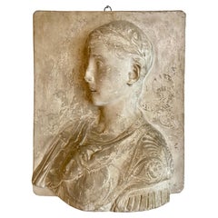 Antique Stucco bust of a young roman emperor in relief.