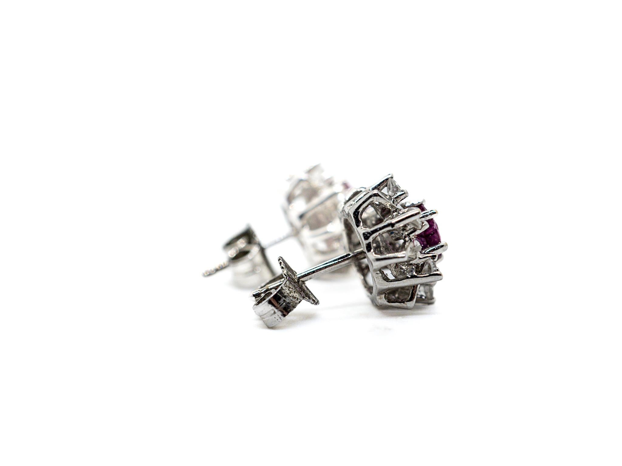 Introducing our exquisite Stud Earrings, crafted with exceptional precision and elegance. These stunning earrings are made of 18K white gold, radiating a contemporary and sophisticated allure.

The focal point of each earring is a captivating