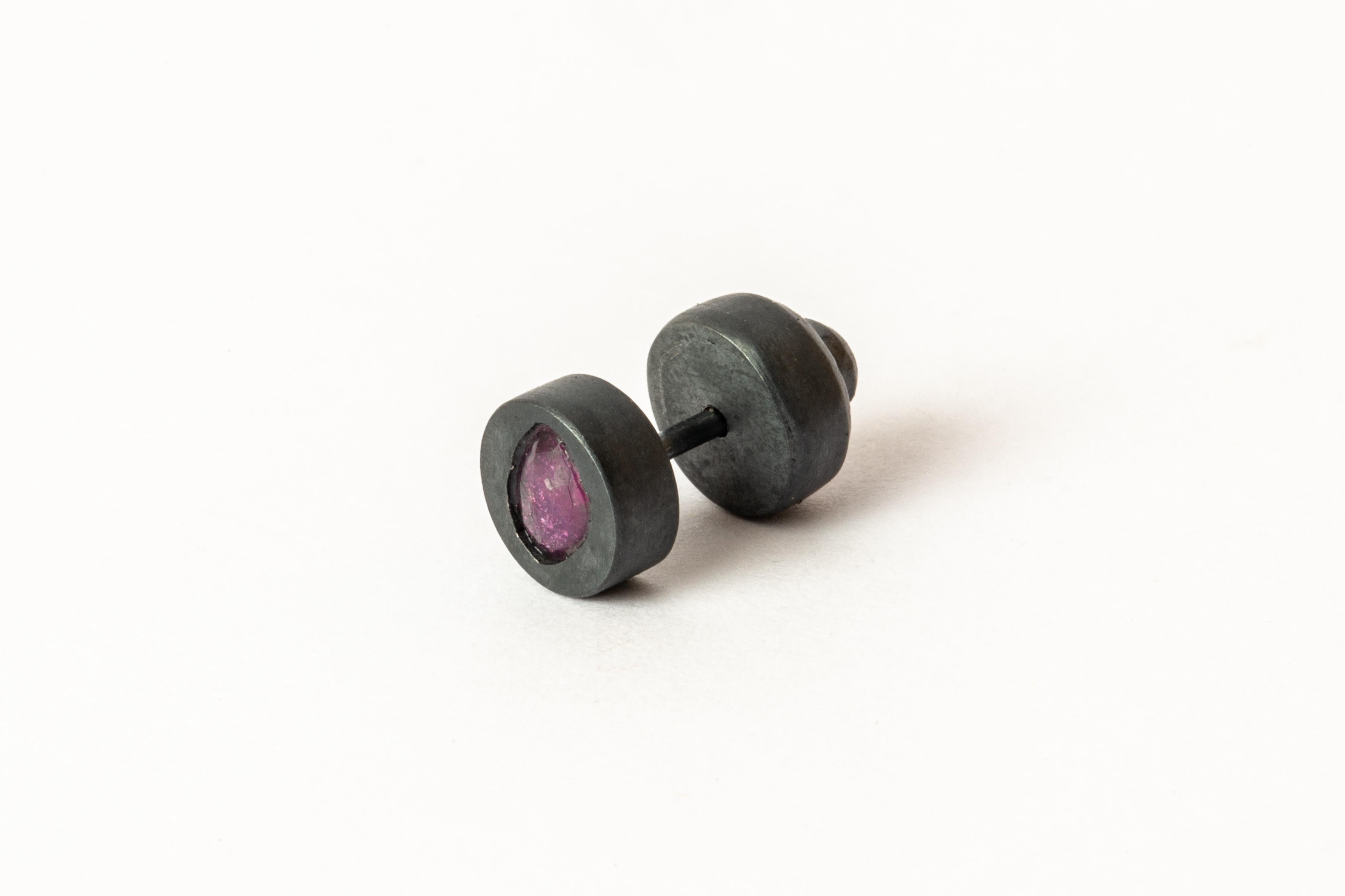 Stud earring in sterling silver and a slab of rough ruby (faceted). This item is made with a naturally occurring element and will vary from the photograph you see. Each piece is unique and this is what makes it special. Please note that Black
