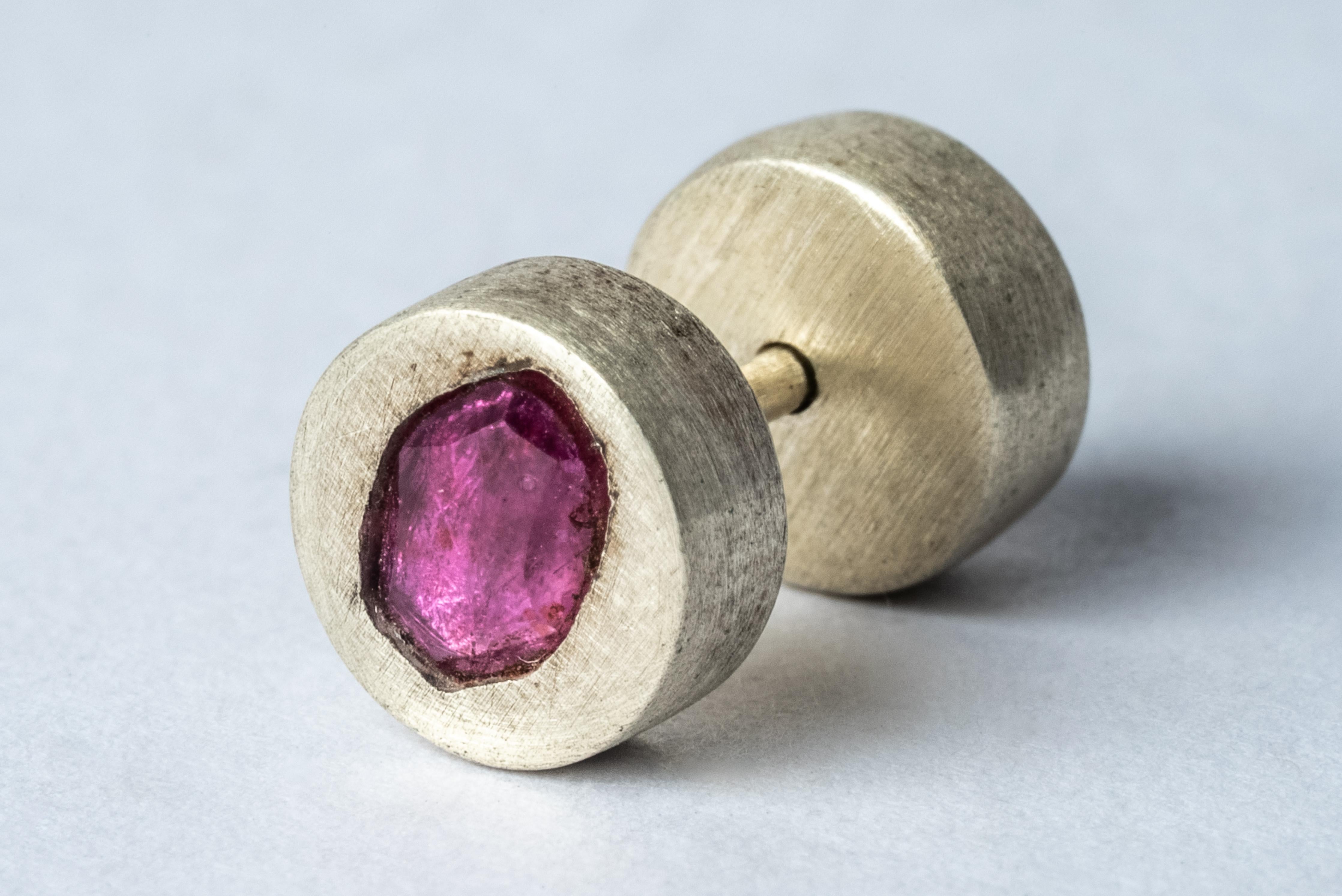 Stud earring in sterling silver and a slab of rough ruby (faceted). This item is made with a naturally occurring element and will vary from the photograph you see. Each piece is unique and this is what makes it special
Sold as a single piece.