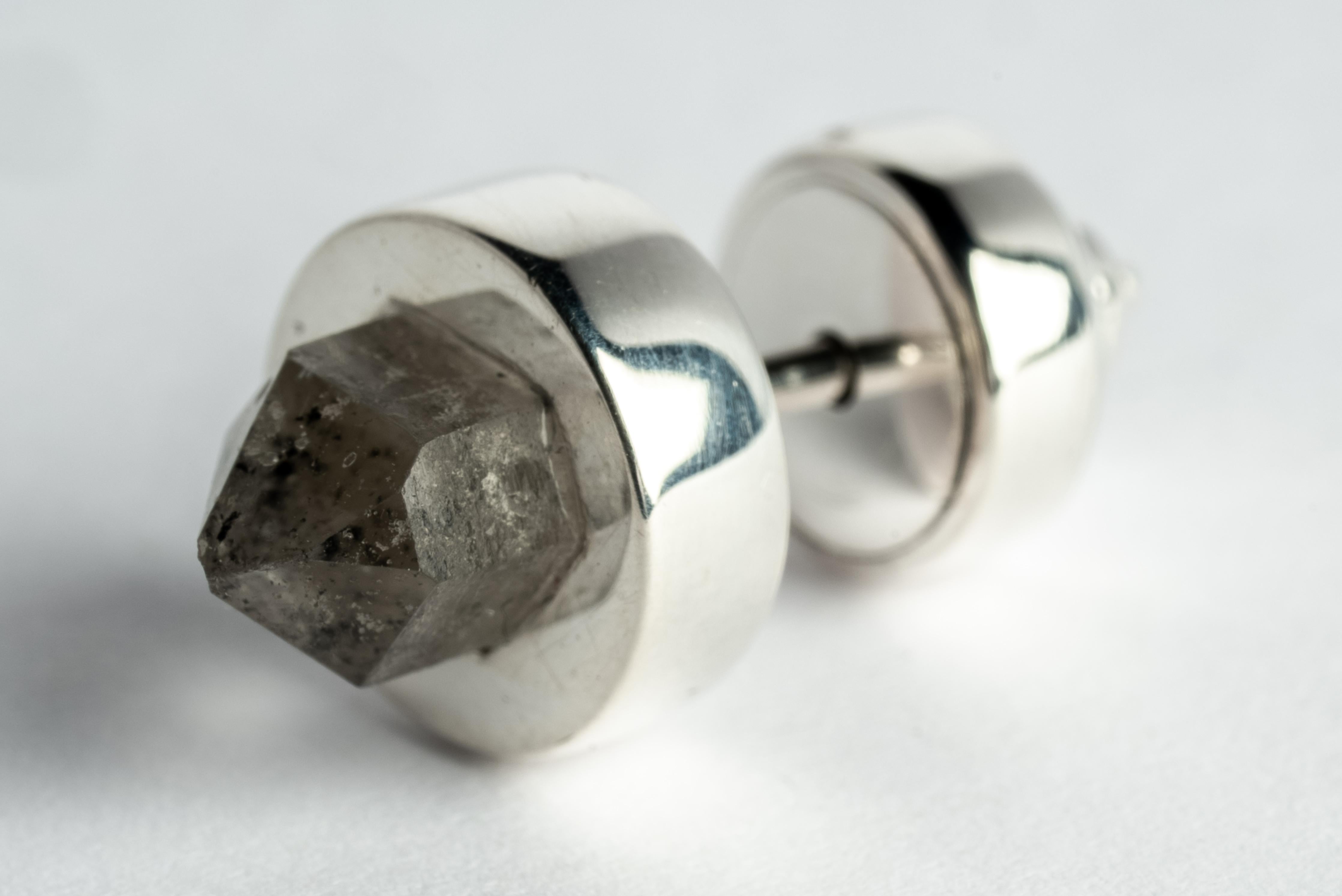 Stud earring in polished sterling silver and double-terminated quartz crystals. This item is made with a naturally occurring element and will vary from the photograph you see. Each piece is unique and this is what makes it special.
Sold as single