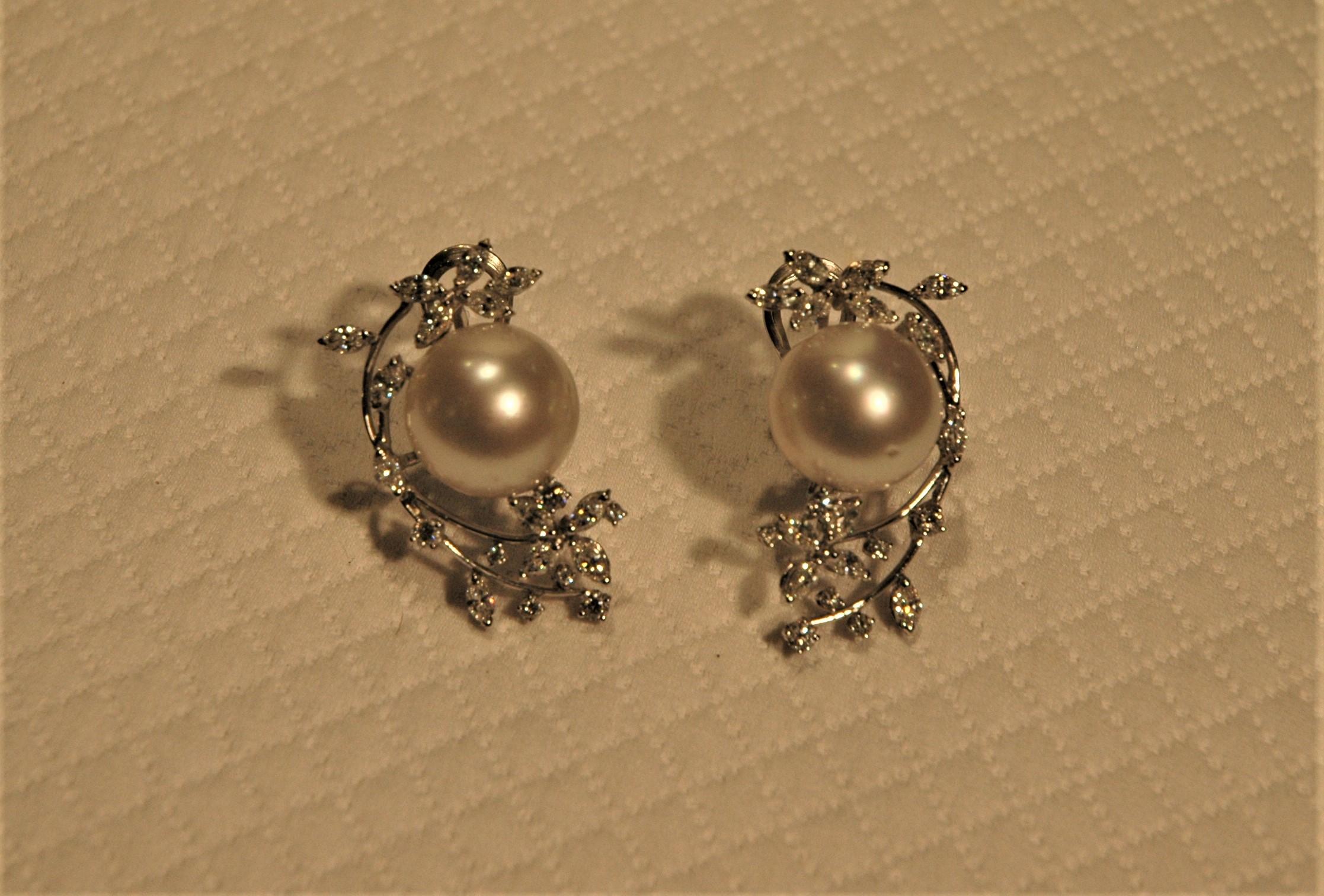 Beautiful stud earrings 18 kt white gold, 2.89-carat diamonds, and white Australian pearls. They are perfect for a bridal occasion and for a night party. The diamonds are brilliant cut and marquise cut. Special Italian manufacturing.