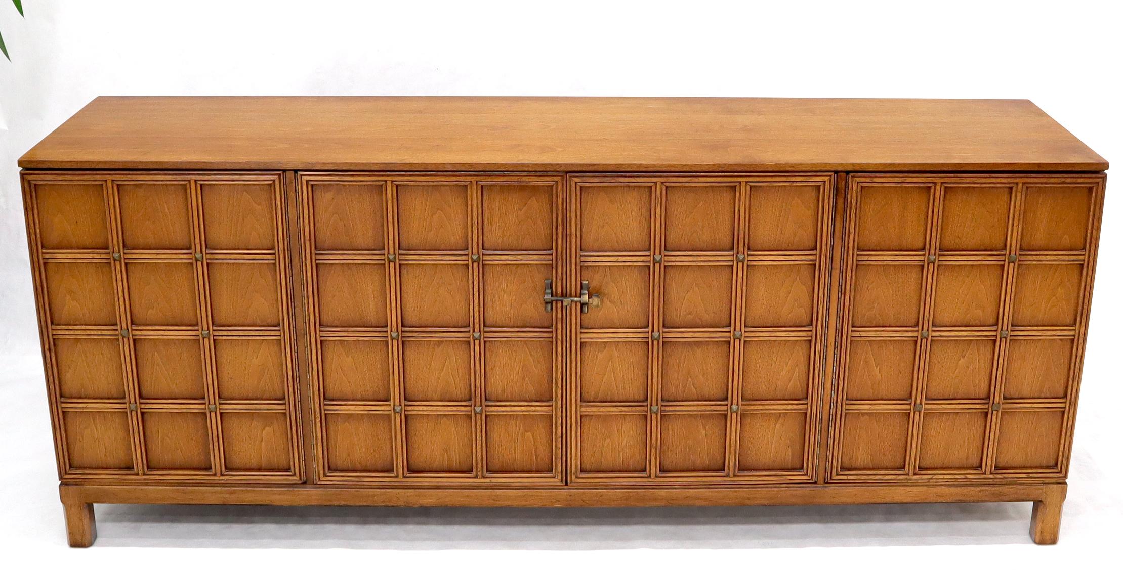 Mid-Century Modern studded 4 doors long credenza dresser cabinet possibly made by Henredon.