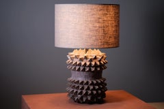 Studded Stoneware Barrel Table Lamp with Dark Grey Linen Shade by LGS Studio