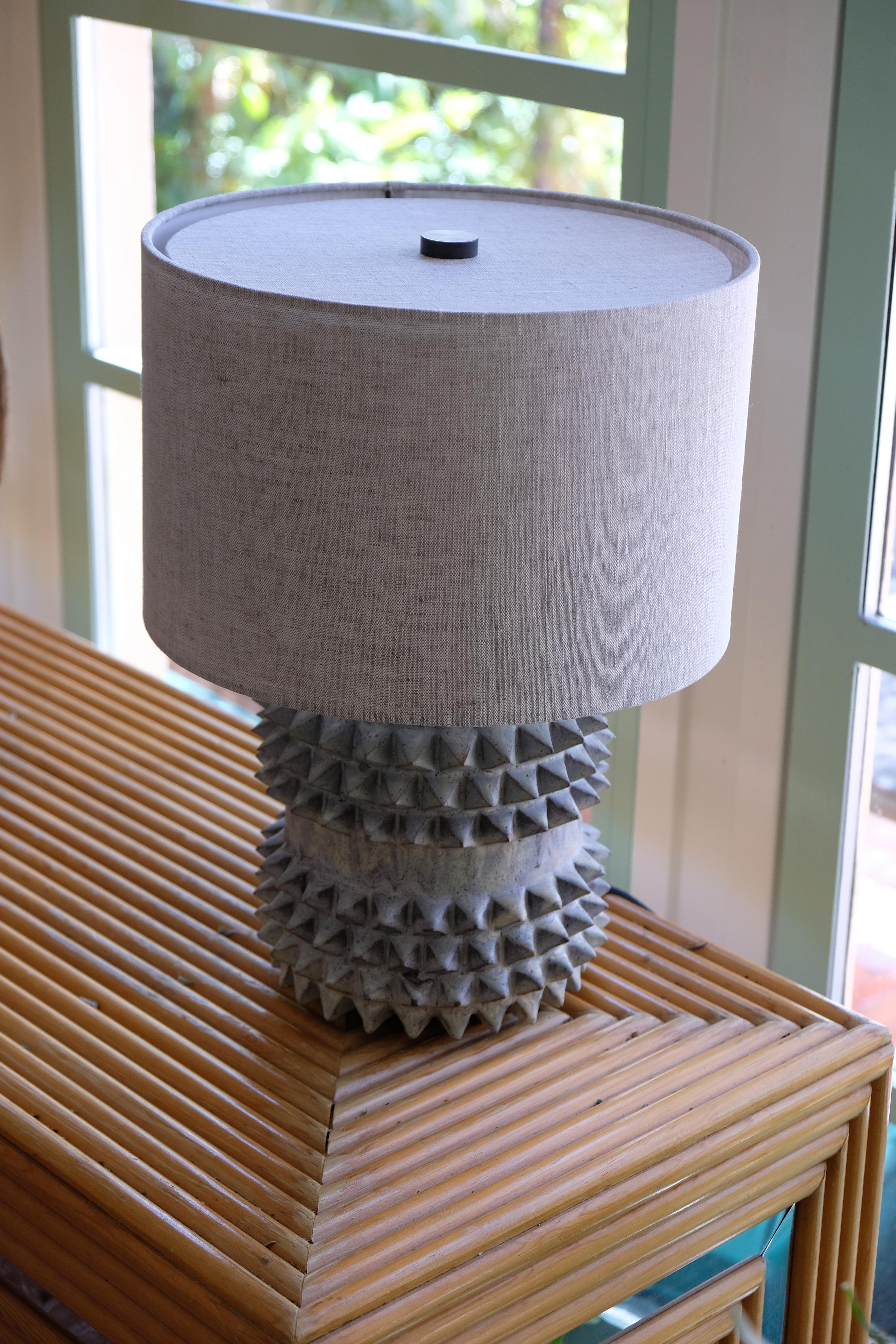 American Studded Stoneware Barrel Table Lamp with Grey Linen Shade by LGS Studio For Sale