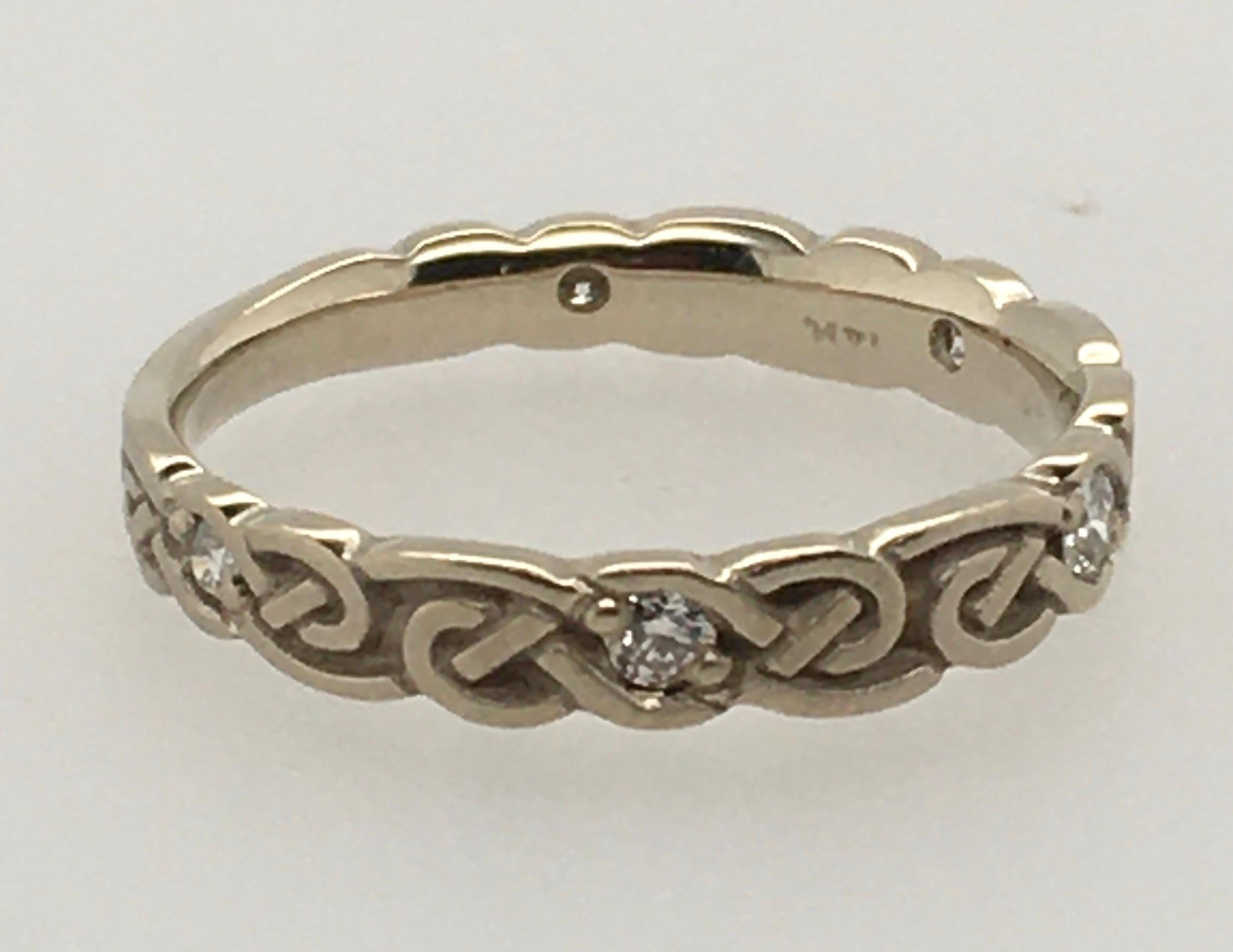 STUDIO 311 Narrow Infinity Knot with Scattered Diamond Design in White Gold Band In Excellent Condition For Sale In Kennebunkport, ME