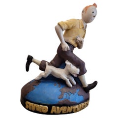 STUDIO ADVENTURES yellow blue Tintin and Snowy running around the world map 90