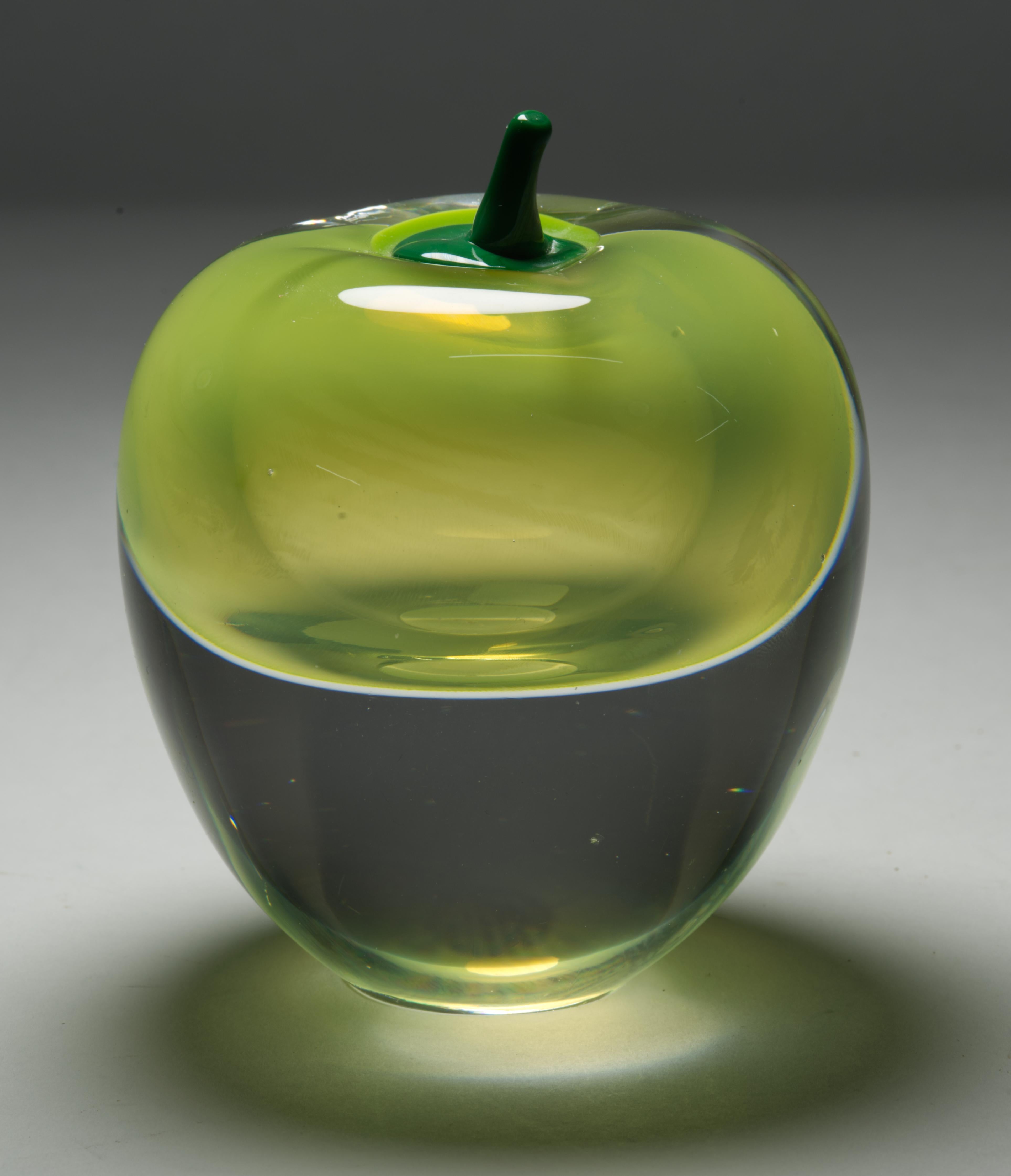  Rare vintage art glass apple sculpture or paperweight by Studio Åhus was handmade in Sweden in 1988 in sommerso technique that originated in Murano, Italy. The core of smoky light green glass with ombre color gradation is submerged inside the clear