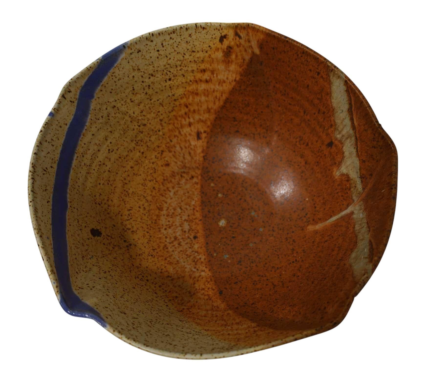Beautiful studio art pottery bowl, signed. Great detail and texture. Beautiful colors, browns, rust, blue. Subtle indentations around bowl give it a unique shape. 