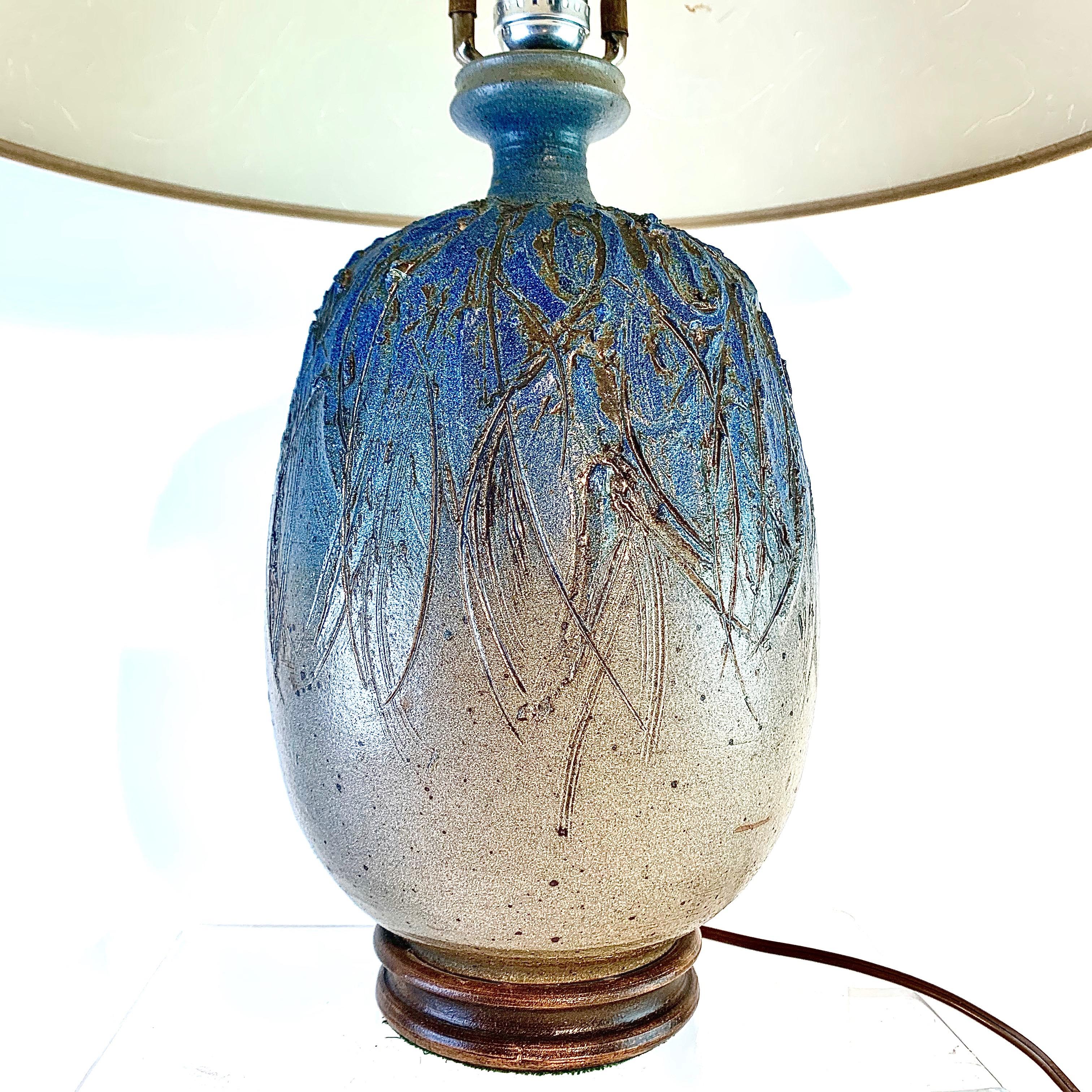 A glazed and artfully incised stoneware table lamp, circa 1960s, by Middleboro, Massachusetts artist John Moakley (1931-2002). Moakley was a well respected modernist potter who taught in the Boston area and exhibited at the Nationals throughout the