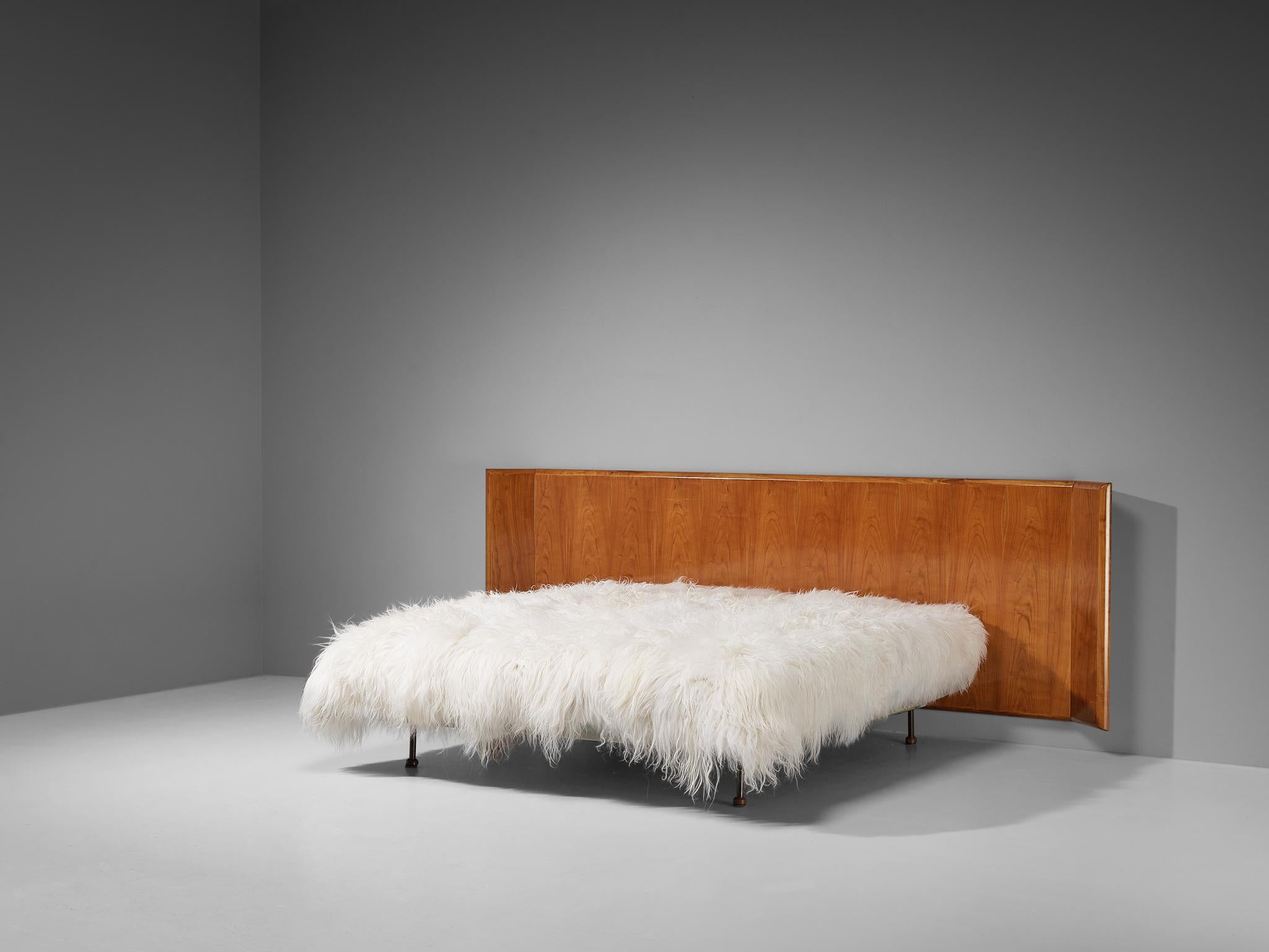 white fluffy bed frame