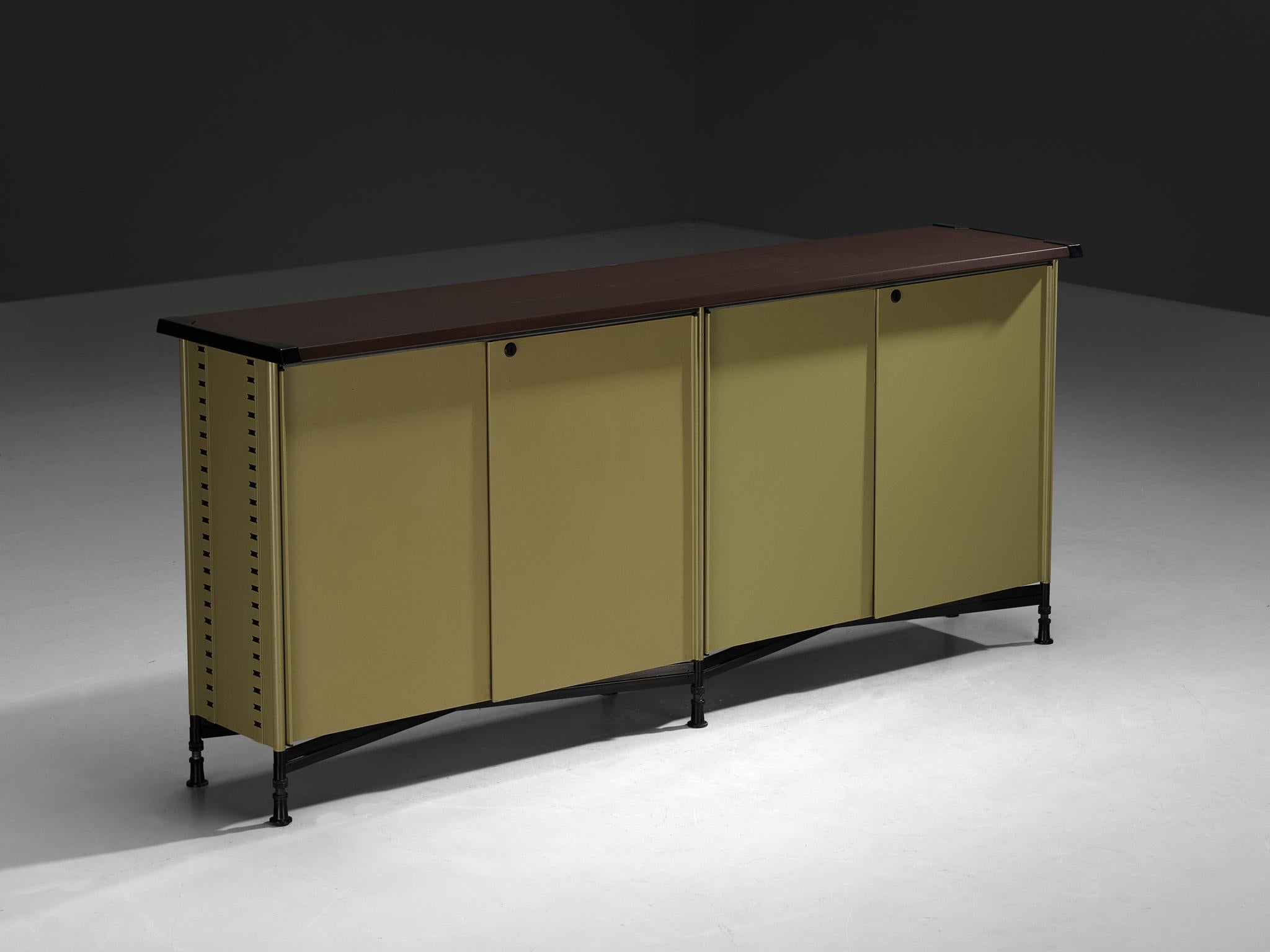 Studio BBPR for Olivetti, 'Spazio' sideboard, lacquered steel, faux leather, vinyl, plastic, Italy, design 1959/60, production 1960s 

In 1954, Olivetti, the Italian office equipment manufacturer, hired BBPR to design their New York showroom on