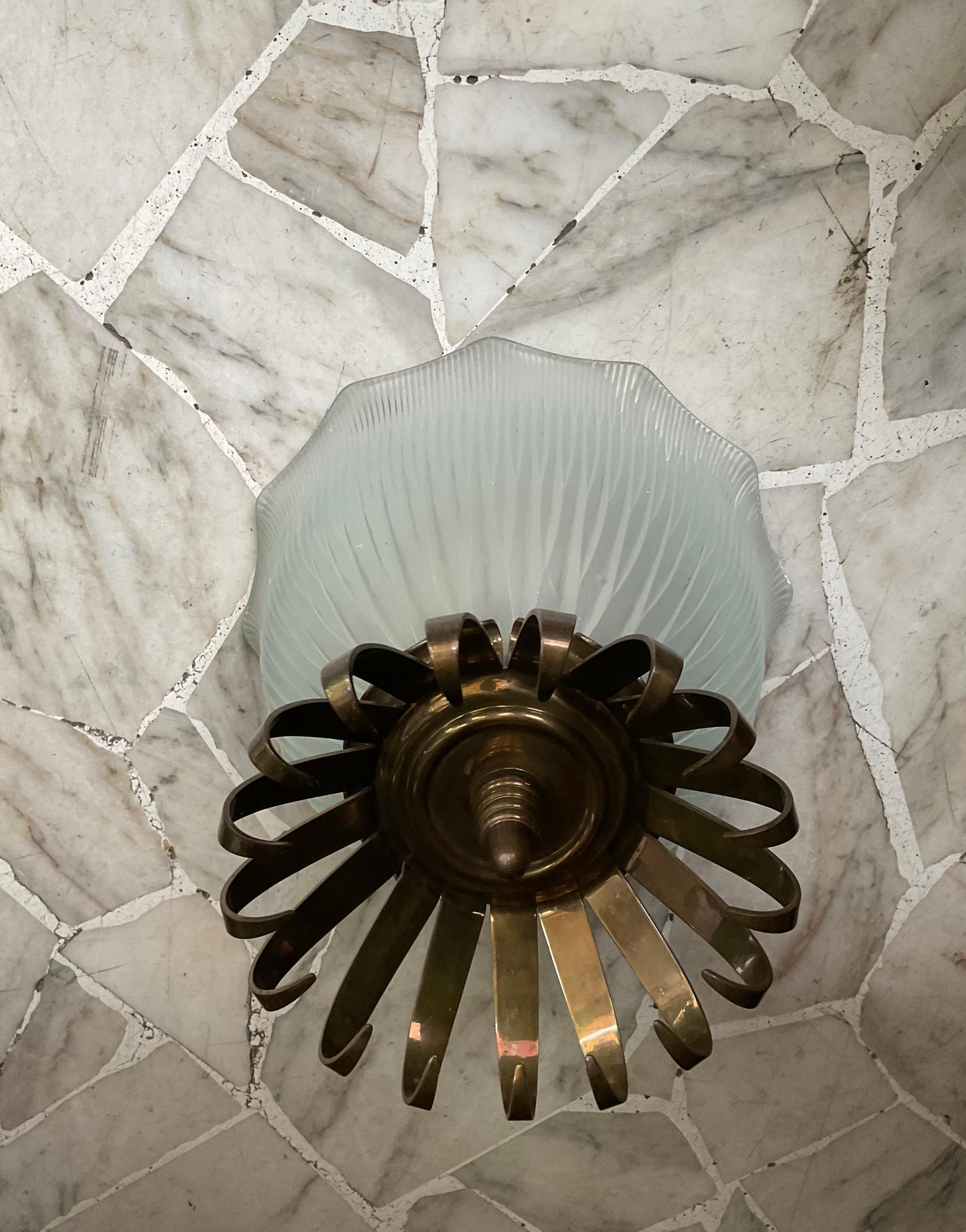 A rare ceiling light of excellent quality the metal is a fusion of bronze and brass and the glass is molded.
For quality and elegant design we can attribute this ceiling light to BBPR studio,
consisting of the Italian architects, Gian Luigi Banfi,