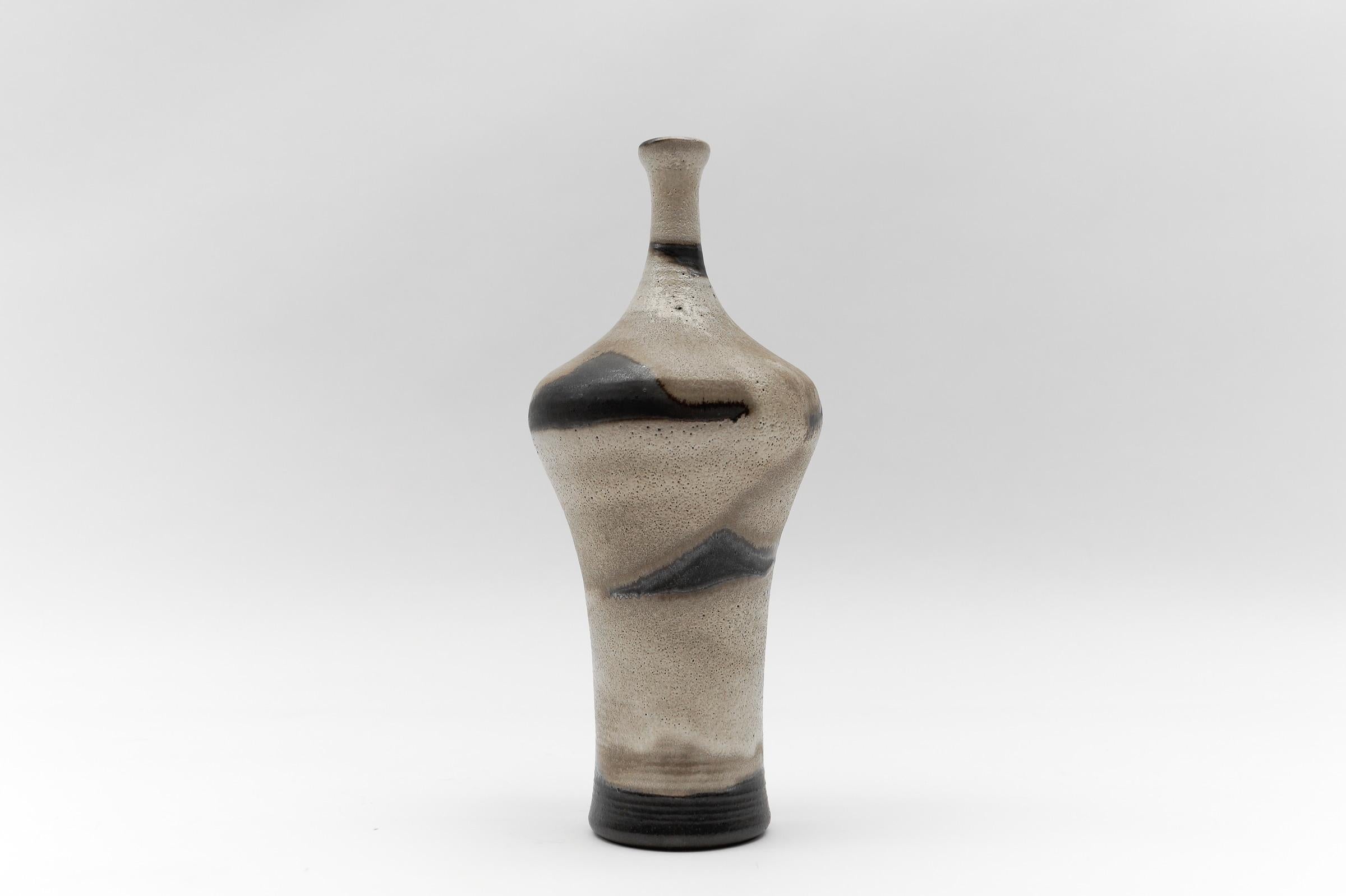 Studio Ceramic Vase by Elly Kuch for Wilhelm & Elly KUCH, 1960s, Germany

Dimensions:
Height: 11.02 in (28 cm)
Diameter: 4.72 (12 cm)

Very good condition.

-------------------------------------

Wilhelm Kuch, born 1925, 1947 apprenticeship - Gusso