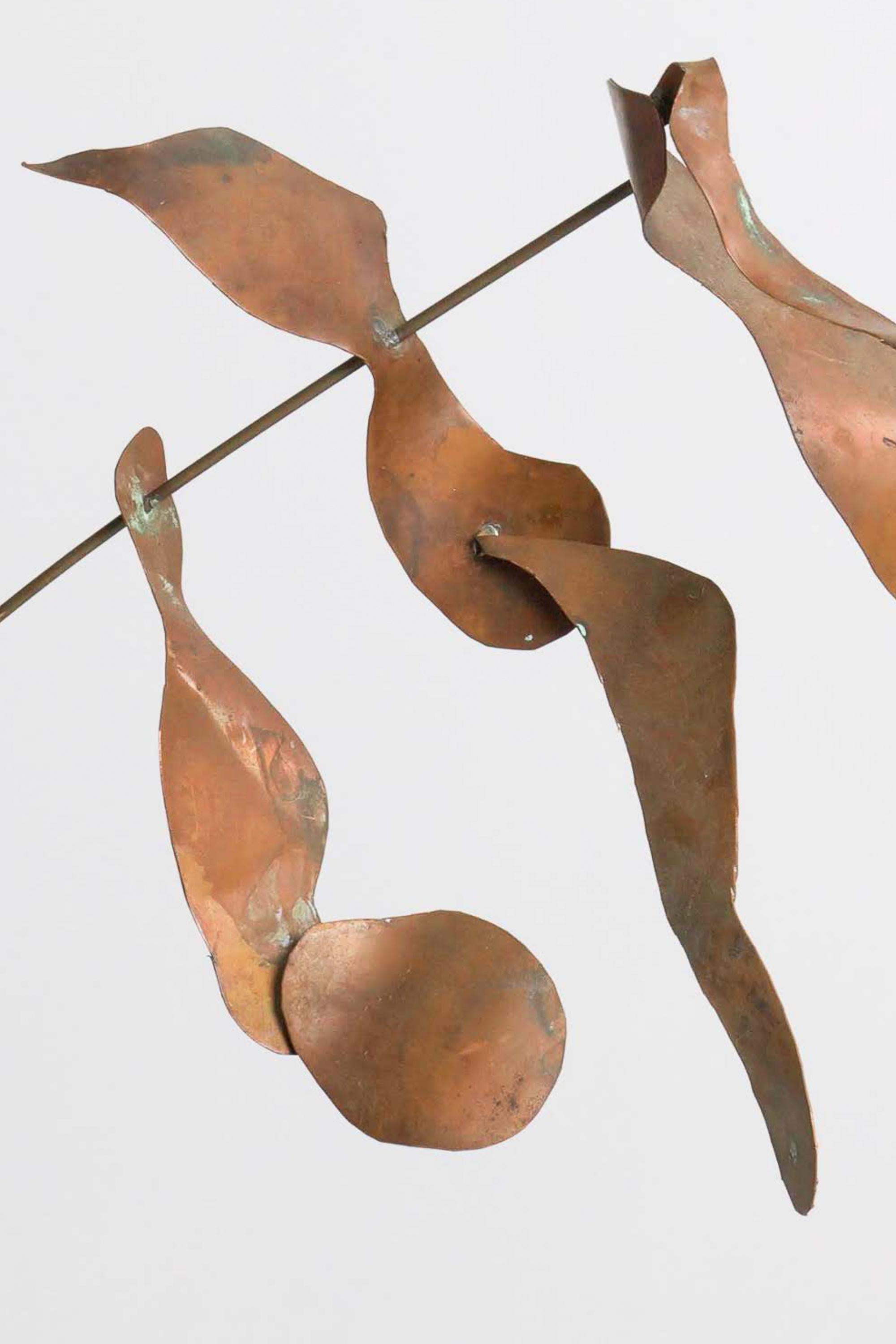 Studio Craft Kinetic sculpture with handmade freeform copper cutouts. Sits on heavy block of steel.