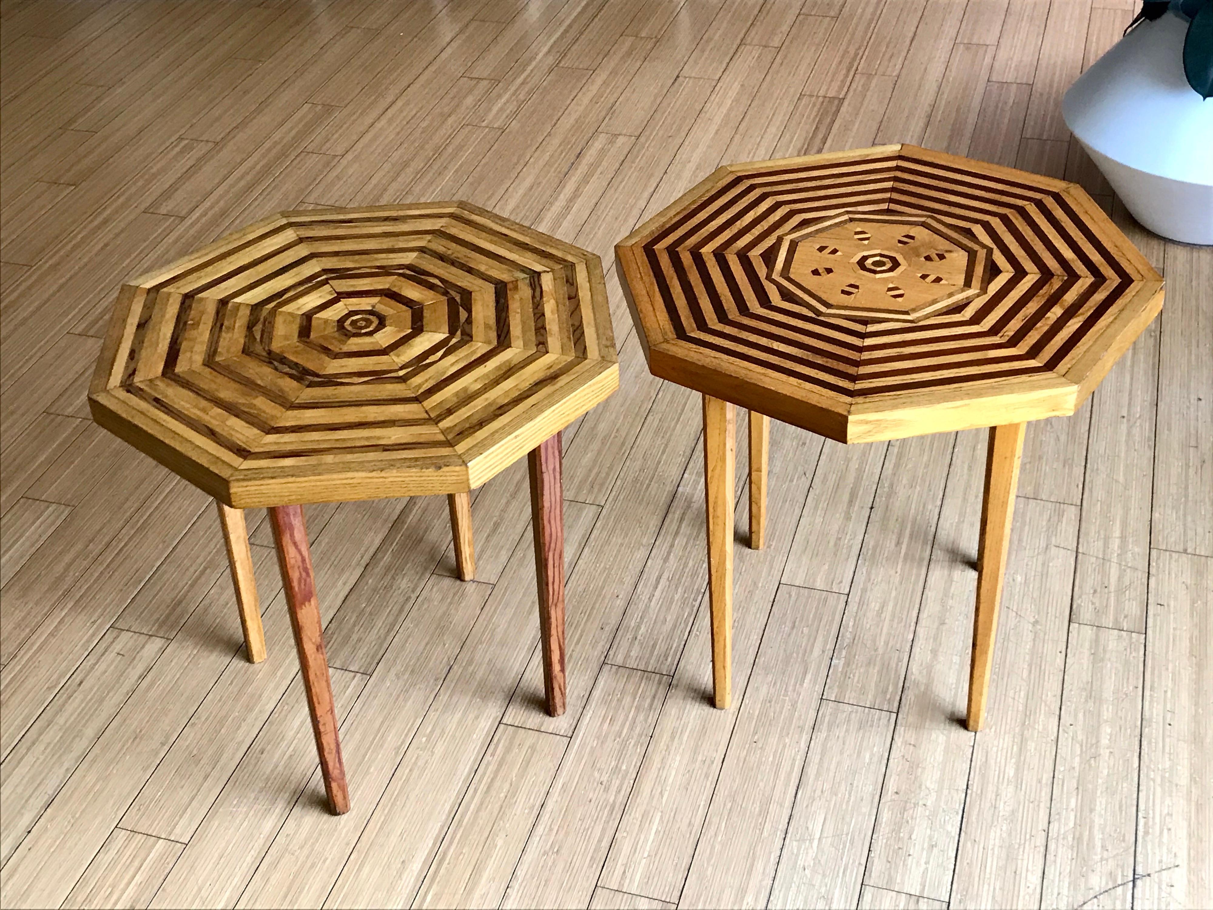 Great one-off designs
occasional tables
handmade with mixed inlaid woods
one is slightly taller than the other
fine original condition
solid and sturdy.

 