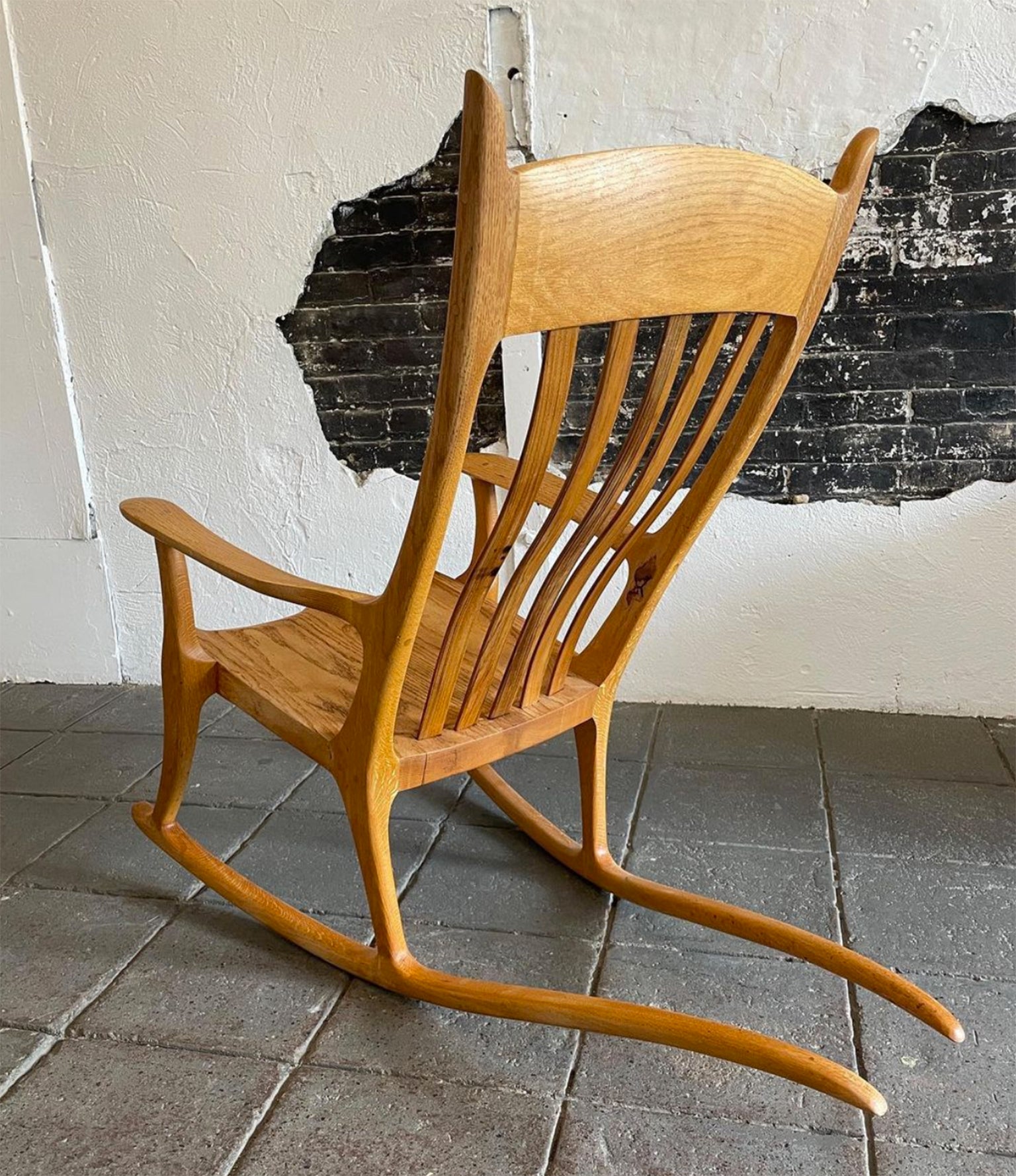 Beautiful American Studio Craft Oak Rocking Chair in the style of Sam Maloof. Amazing sculptural hand made rocking chair. The chair is structural and functional. No Signatures or Labels. Located In Brooklyn NYC. 

41