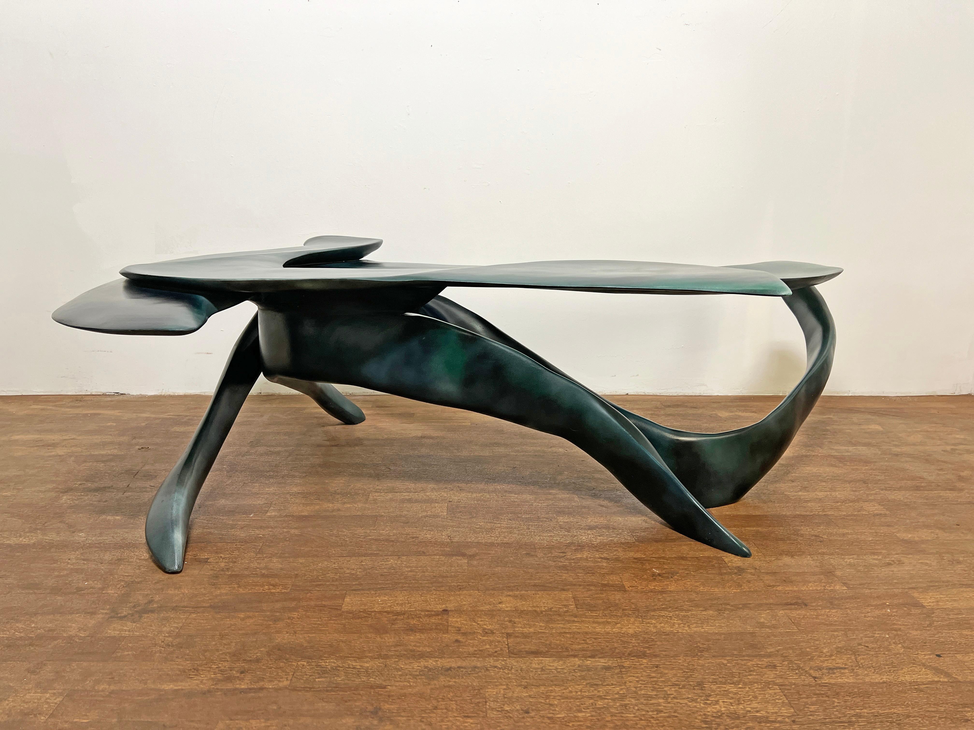 Studio craft freeform coffee table of carved wood in aquamarine lacquer signed Walsh, 1989 and titled Nui Nalu No. 1 (translates to 