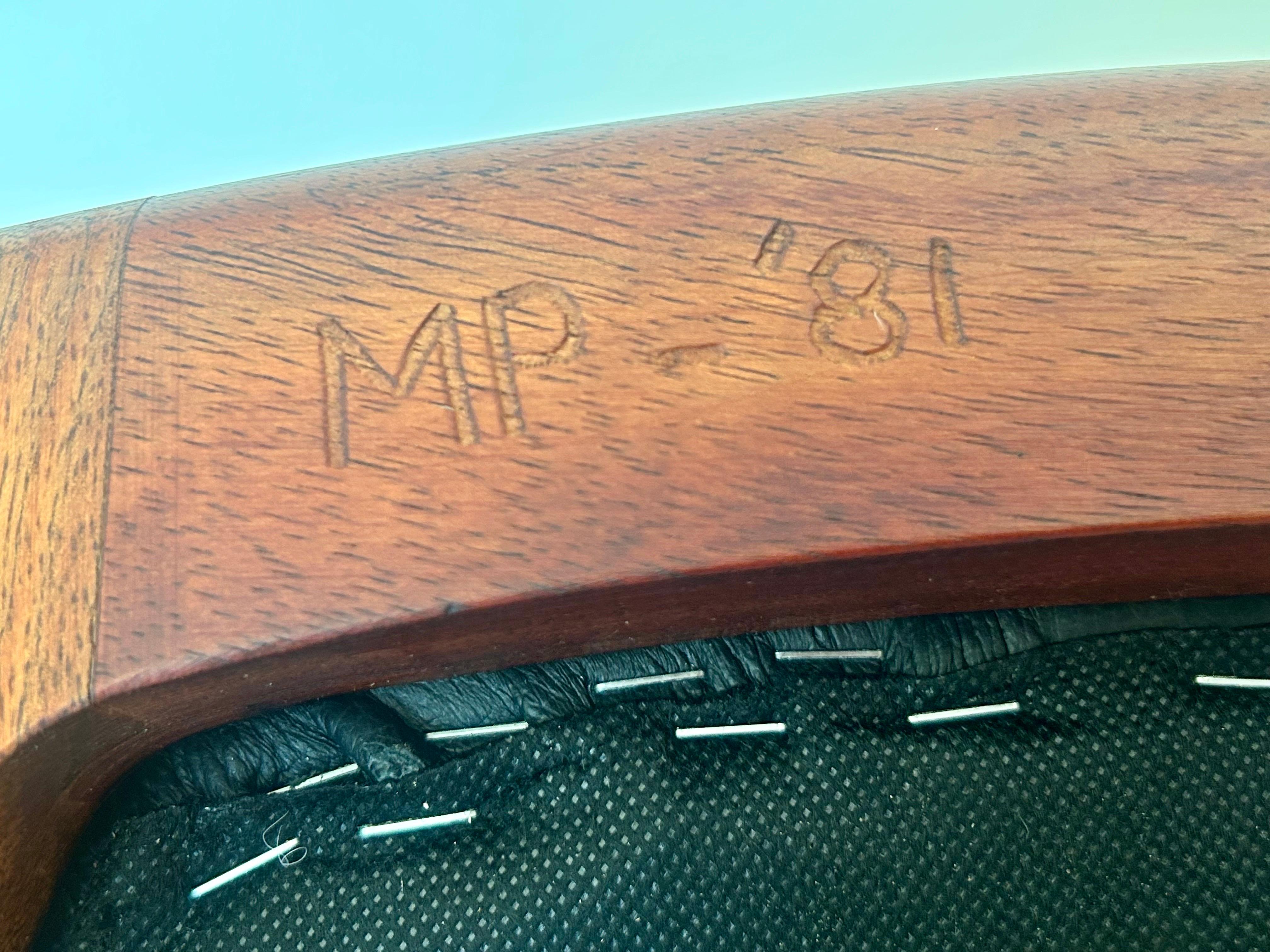 Great studio art chair.
It appears to be a one-off.
Handmade with wonderful joinery detail and bent wood backrest.
The spike / fang backrest design contours comfortably to the back. 
The wood appears to be a black walnut.
Solid and sturdy.
The seat