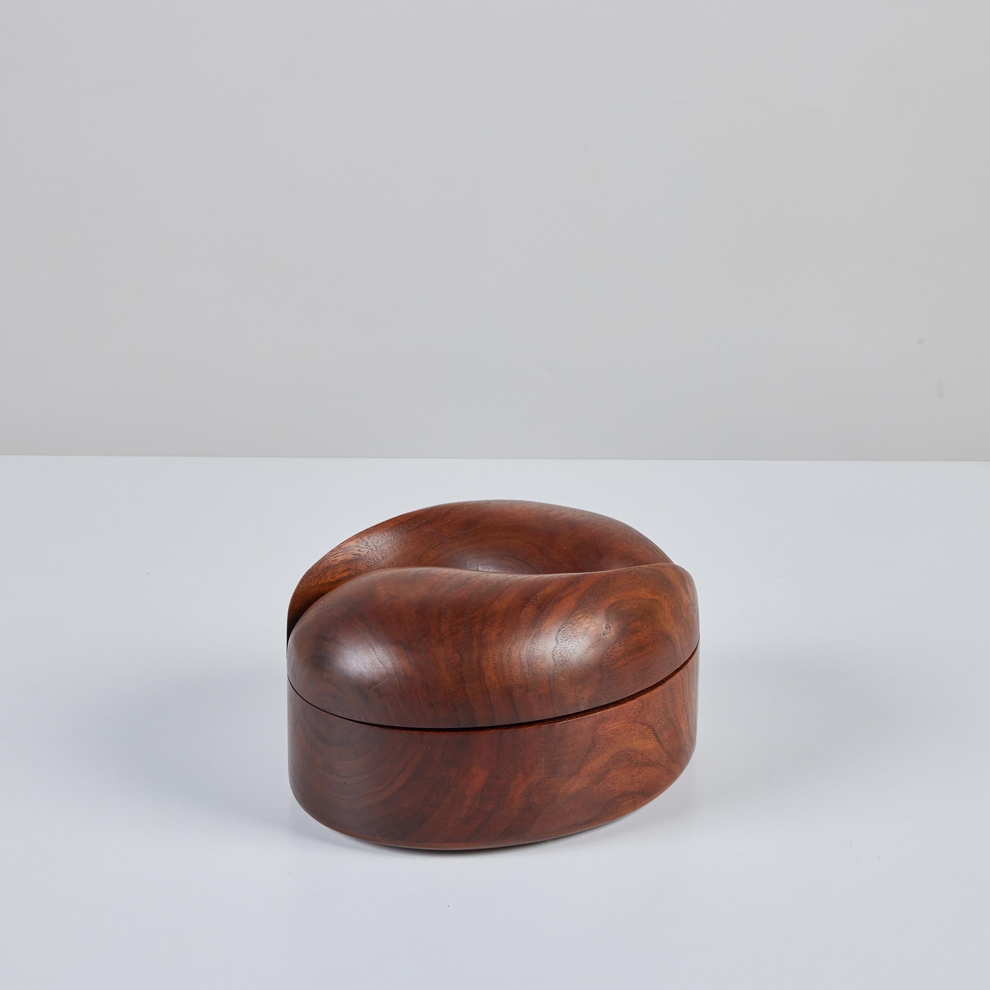Studio craft walnut box with dual compartments by artist Steven Spiro. The box, reminiscent of a 