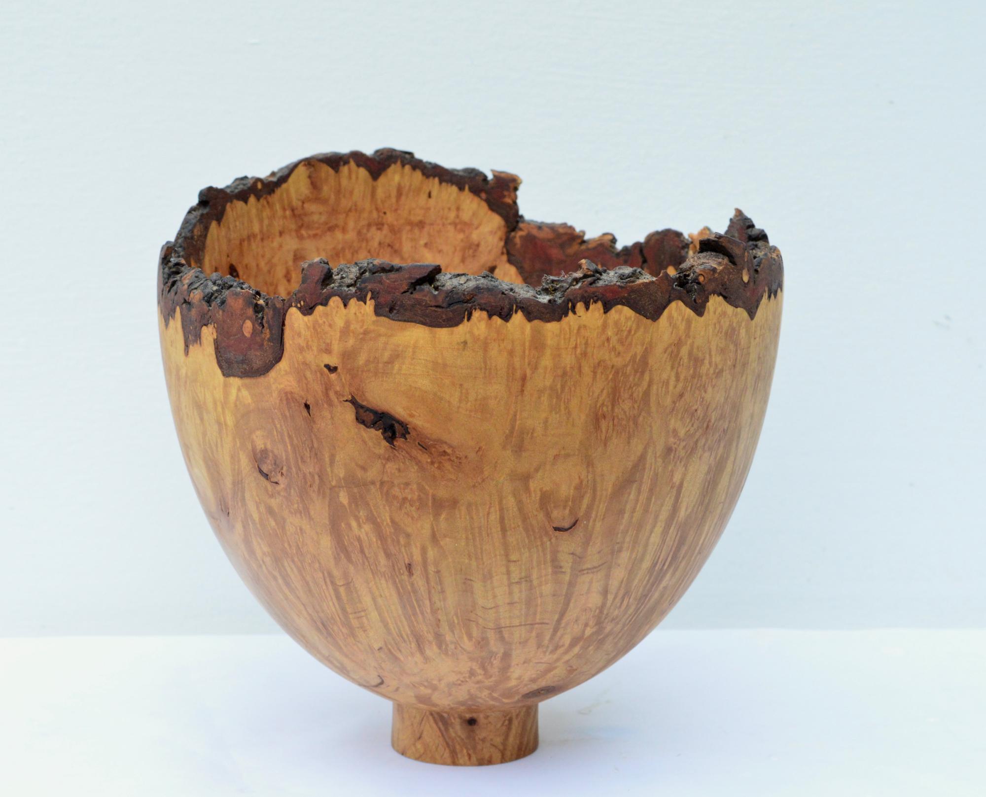 A breathtaking studio made decorative bowl of maple burl by DH Booth. Organic modern style with high end Craft aesthetic, this decorative wood compote will set ablaze your favorite bookshelf or coffee table vignette. Signed and dated underneath.