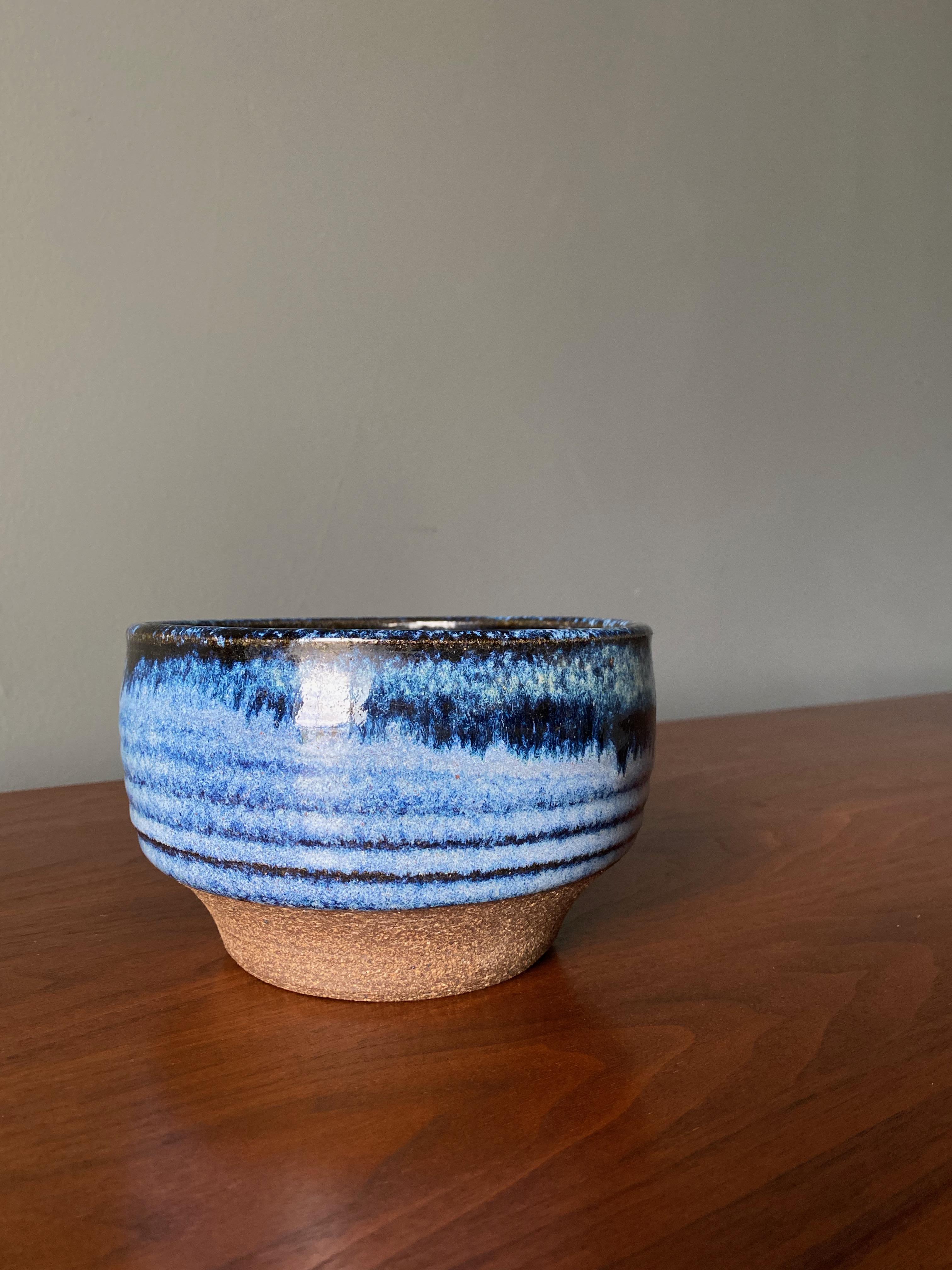 Studio ceramic planter. Beautiful blue glazing with contrasting rough clay lower section.