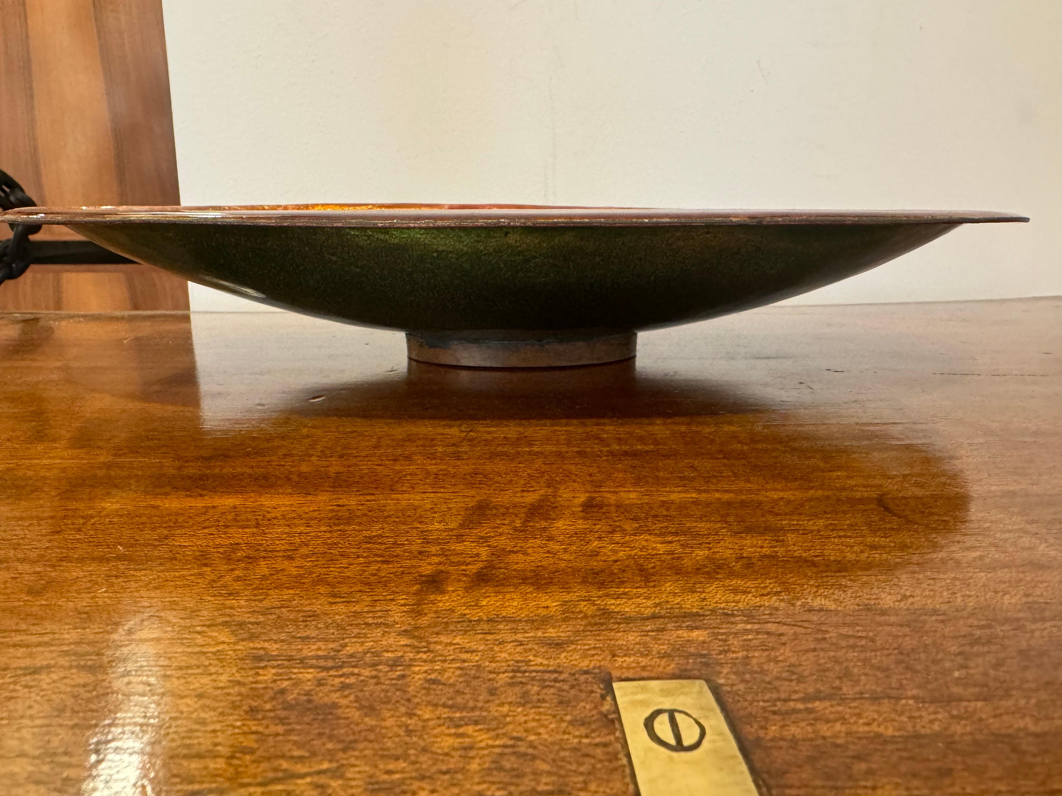 A large enamel center bowl by famed Mid Century Italian design firm, Studio Del Campo. Signed . More of kiln fire mark to one side but doesn’t distract from its beauty.