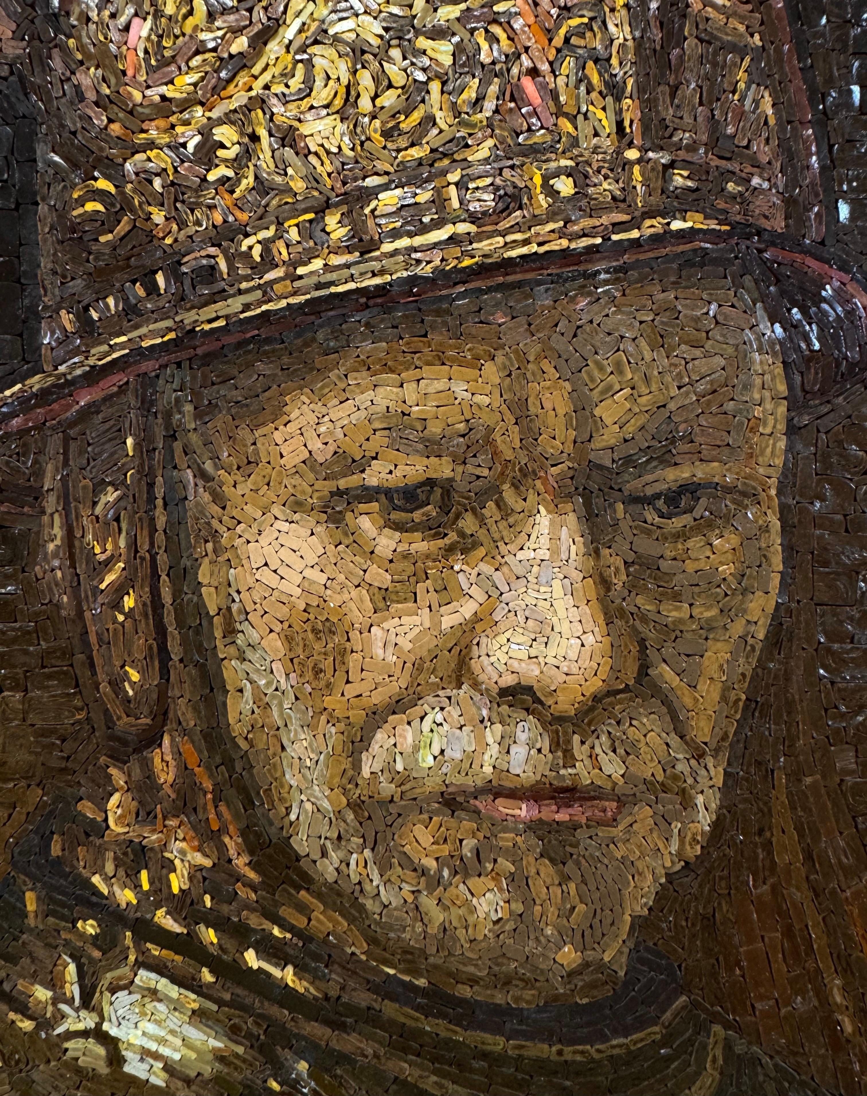 An exceptional micromosaic made by the Vatican Mosaic Workshop after Rembrandt’s celebrated “Man in a Golden Helmet.” Composed of thousands of hand-cut glass tesserae, the work captures the brilliance of Rembrandt’s chiaroscuro with extraordinary