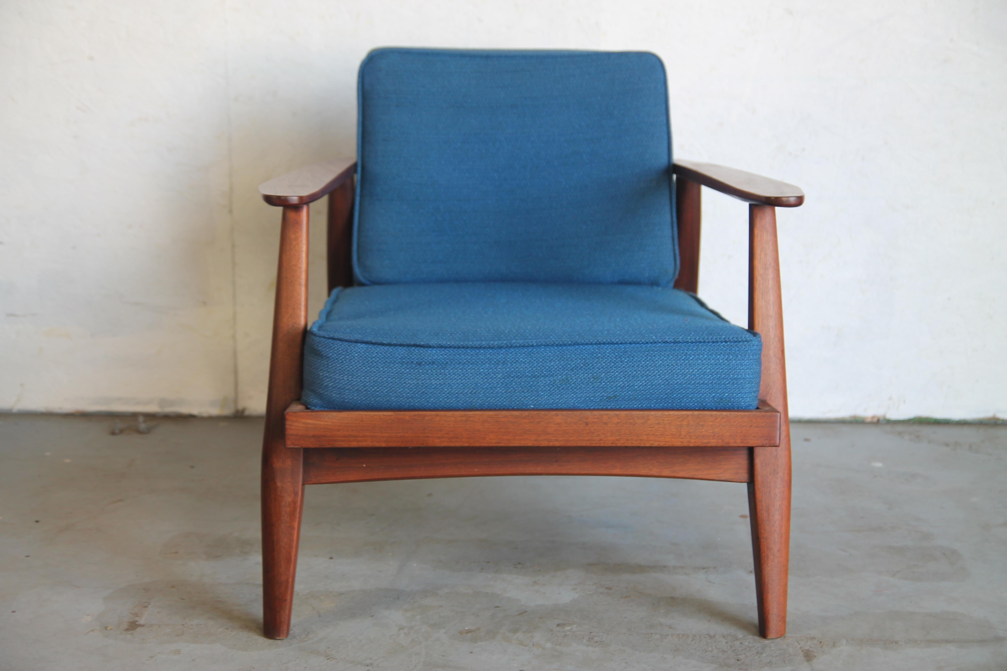 Wonderful 1960s studio designed lounge chair. Walnut chair has interesting design featured. In nice original condition.