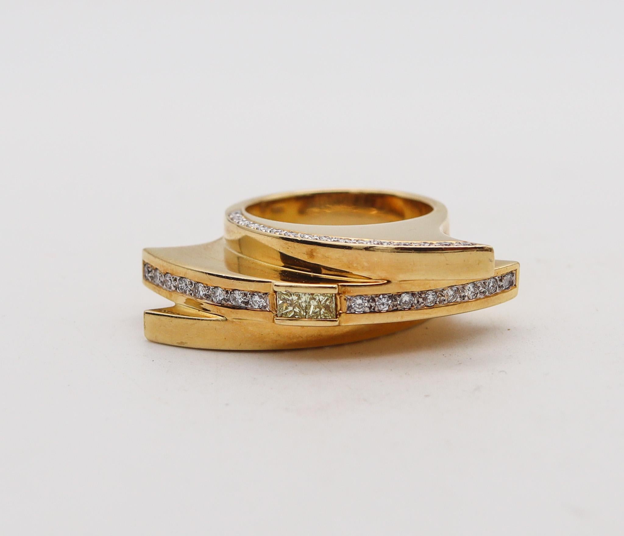 An sculptural cocktail ring with diamonds.

Fantastic studio sculptural ring created in Europe most probably in Germany, back in the 1980. This cocktail ring has been crafted with geometric patterns in solid yellow gold of 18 karats with high