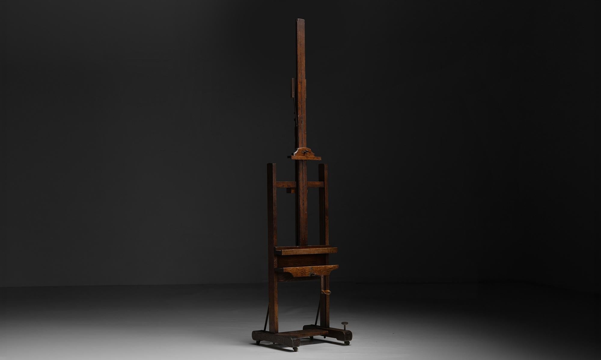 Belgium circa 1890

Wooden easel constructed in oak on wheels with adjustable heights.

22.5”w x 21.5”d x 108”h

(3 of 3)