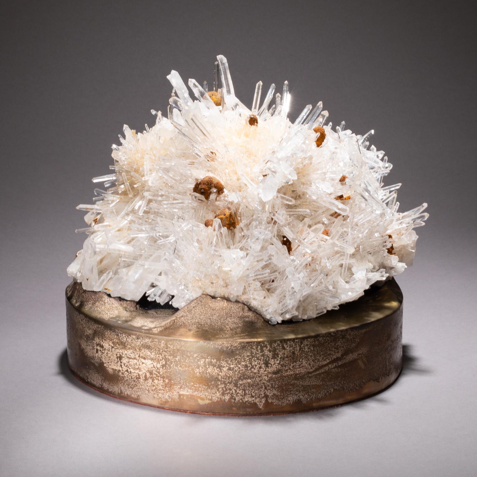 Colombian quartz on cast bronze base

Studio Greytak’s Colombian quartz on cast bronze elevates an eruption of ultra-clear quartz crystals on a flowing cast bronze base. These points are all naturally formed and reinforce natures ability to create
