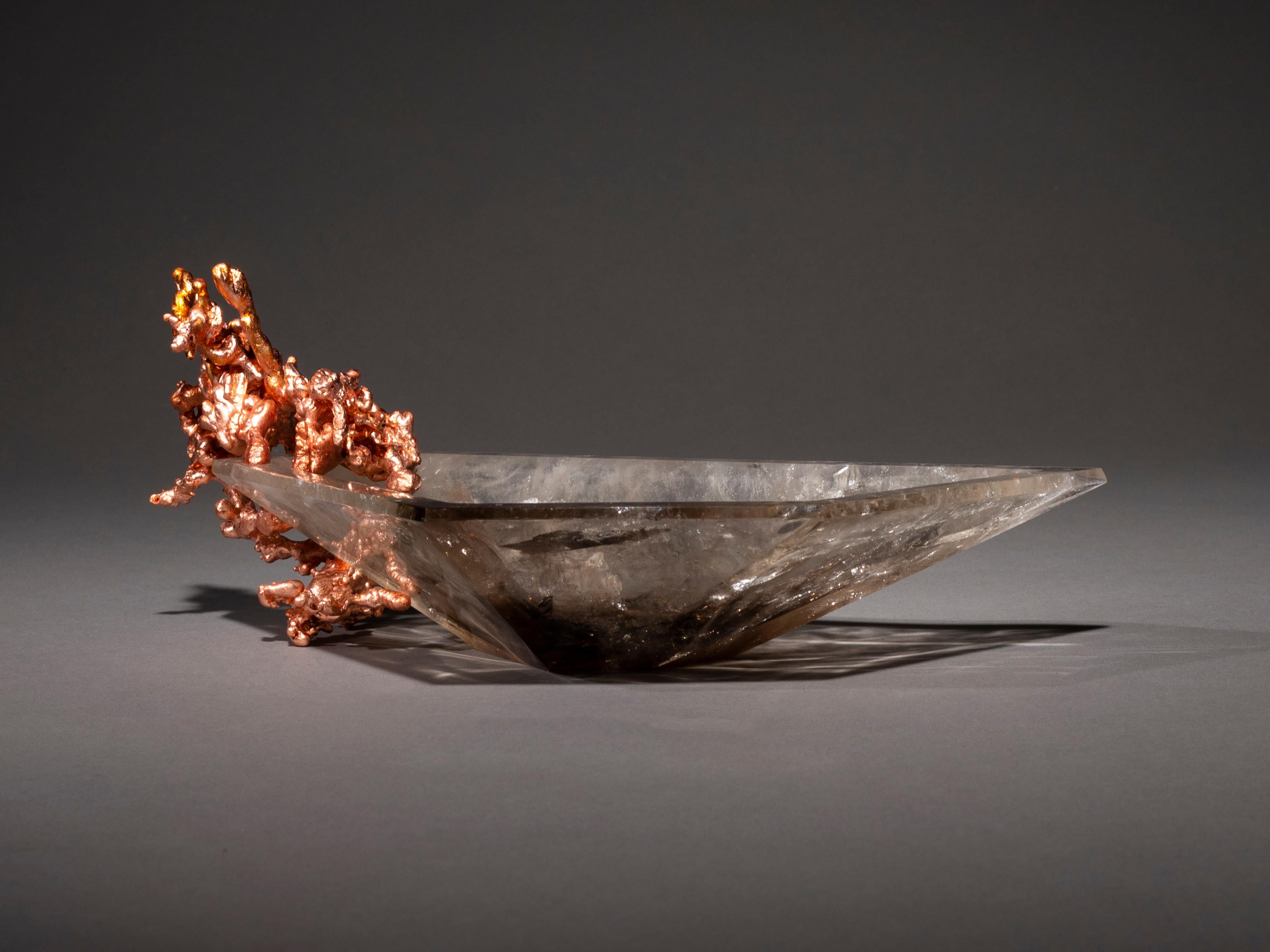 When lava spills down from a volcano into bodies of water or is pushed up from craters below, it creates islands of new earth that change our landscape forever. Studio Greytak’s Crystal Bling Bowl 37 mimics this molten flow of creation with abstract