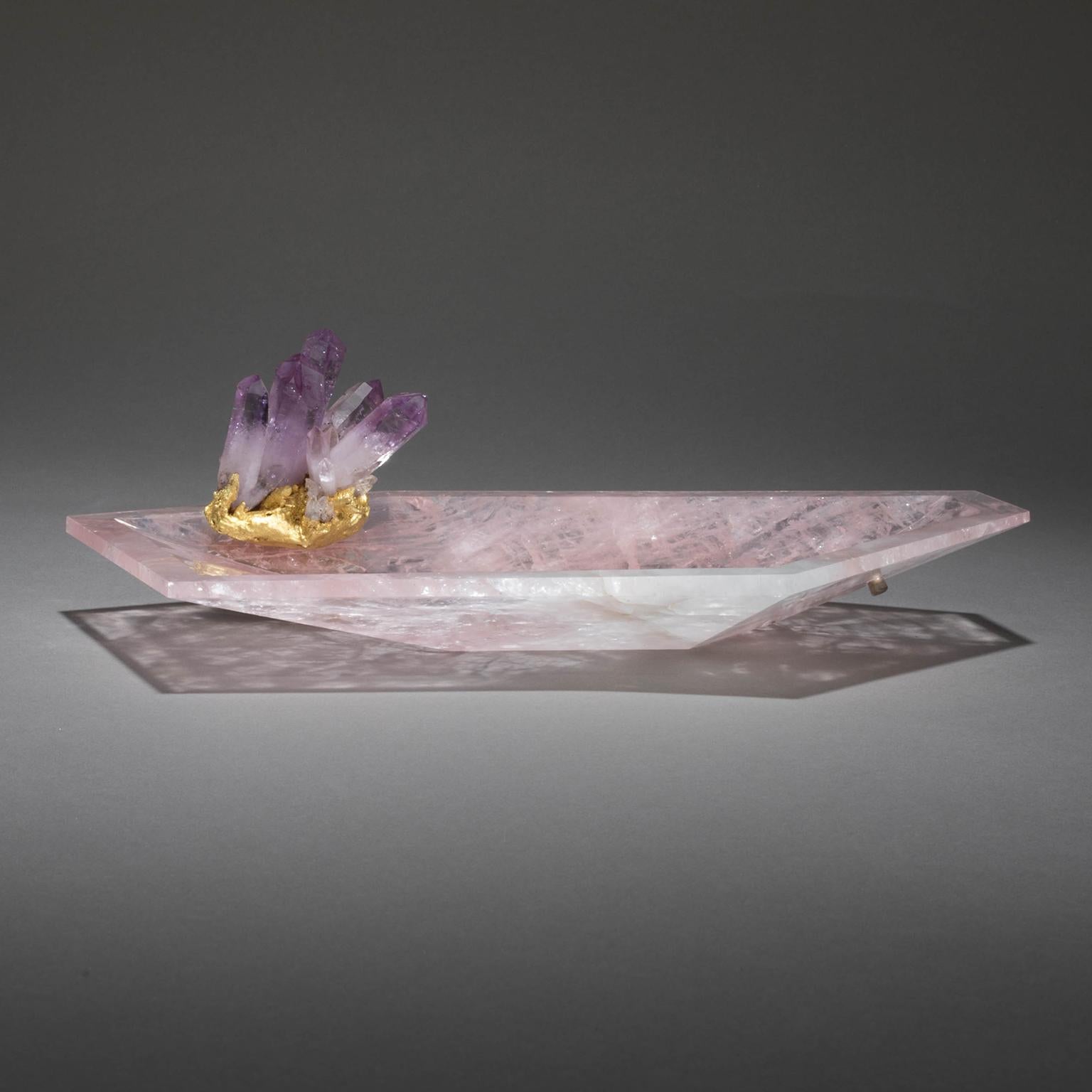 CRYSTAL BLING BOWL 4

Studio Greytak’s Crystal Bling Bowl 4 stretches slowly skyward, pulled toward a mysterious power. A prism of amethyst, the mineral world’s most spiritually charged master, sits, butterfly-like, atop a single-cut rose quartz