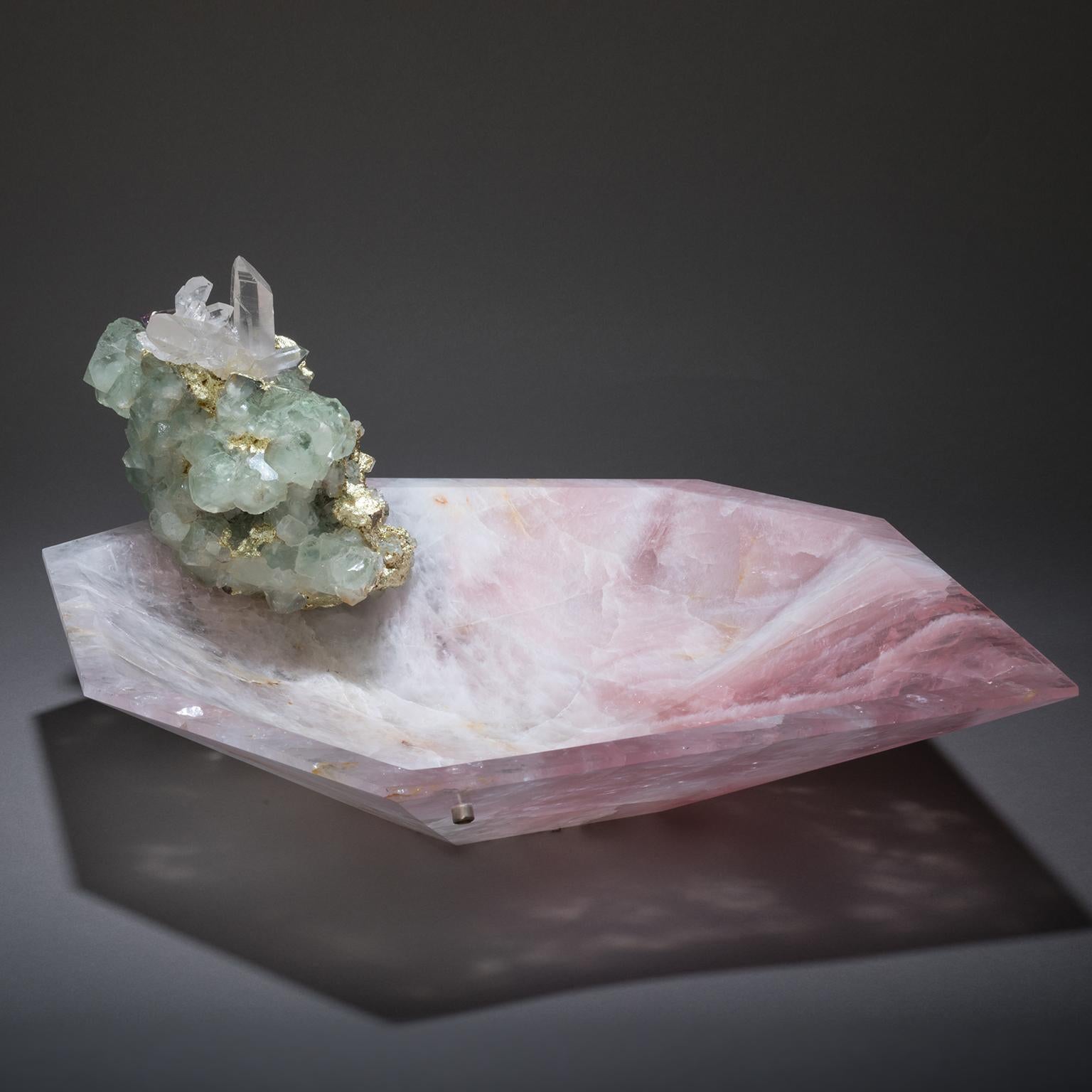 CRYSTAL  BLING  BOWL  9
Love  in  all  its  forms  blossoms  in  Studio  Greytak’s  Crystal  Bling  Bowl  9.  A  single-cut  bowl  of  rose  quartz,  imbued  with  the  power  of  Aphrodite’s  passion,  offers  a  tender  welcome.  Playful  fluorite
