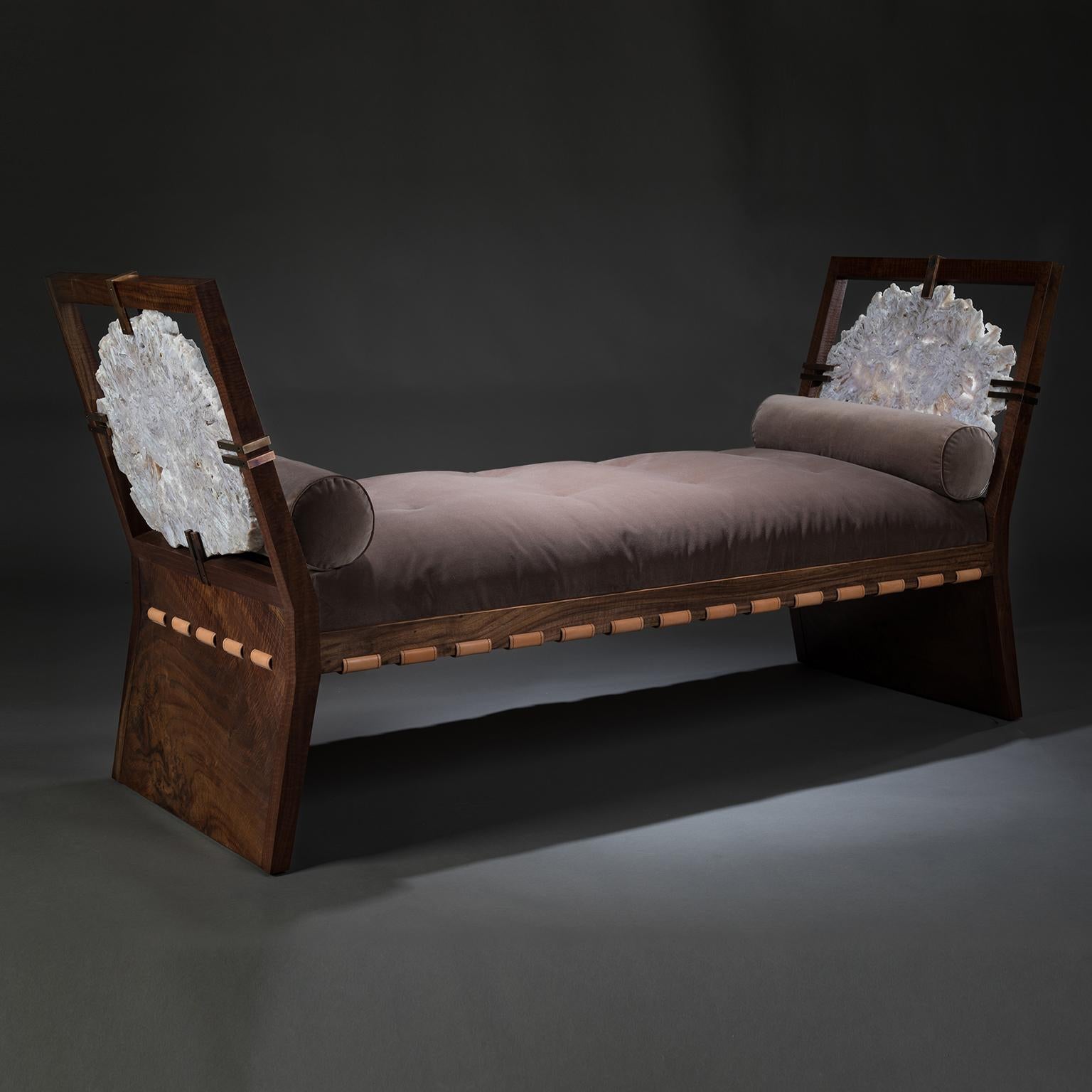 DAYBED

The daybed is as ancient as civilization. In Mediterranean regions, where wood was scarce, they were carved from stone with cloth pillows added for comfort. Studio Greytak’s daybed brings stone and wood together with a slight western flair.