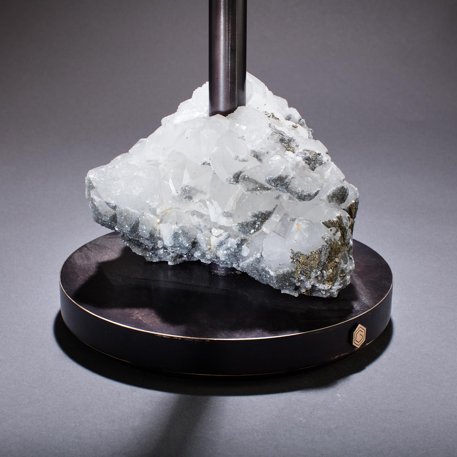 HAVANA TABLE 5

The wisdom of the gods meets the will of man in Studio Greytak’s Havana Table 5. Each prism within the frosted mountain of translucent quartz crystal at the base points skyward, drawing energy and guidance from the spiritual realm,