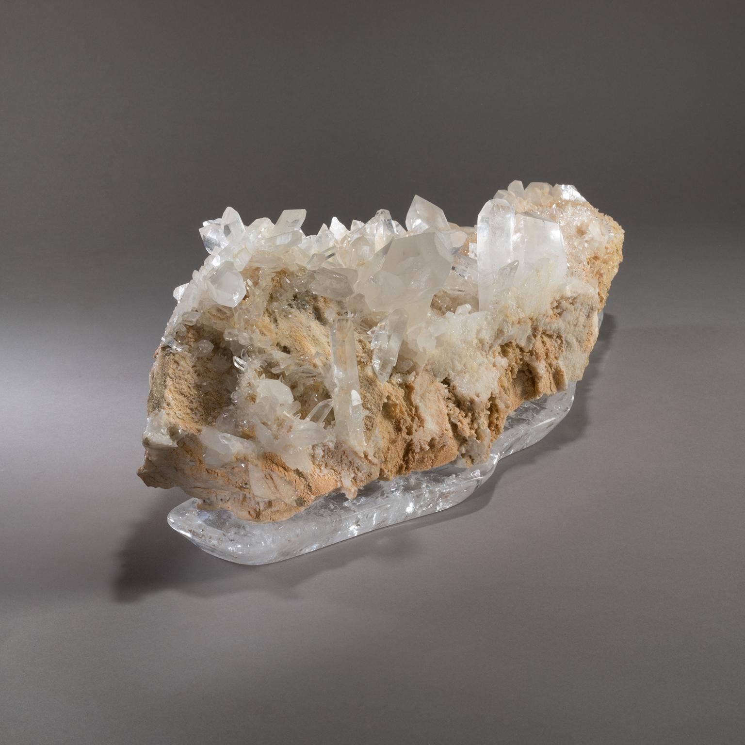 HIMALAYAN QUARTZ ON CRYSTAL BASE

The Himalayas stretch for 1,500 miles, a long, sweeping arc separating the Indian subcontinent and the rest of Asia. Studio Greytak’s Himalayan Quartz on Crystal Base pays homage to these mystic mountains. Icy