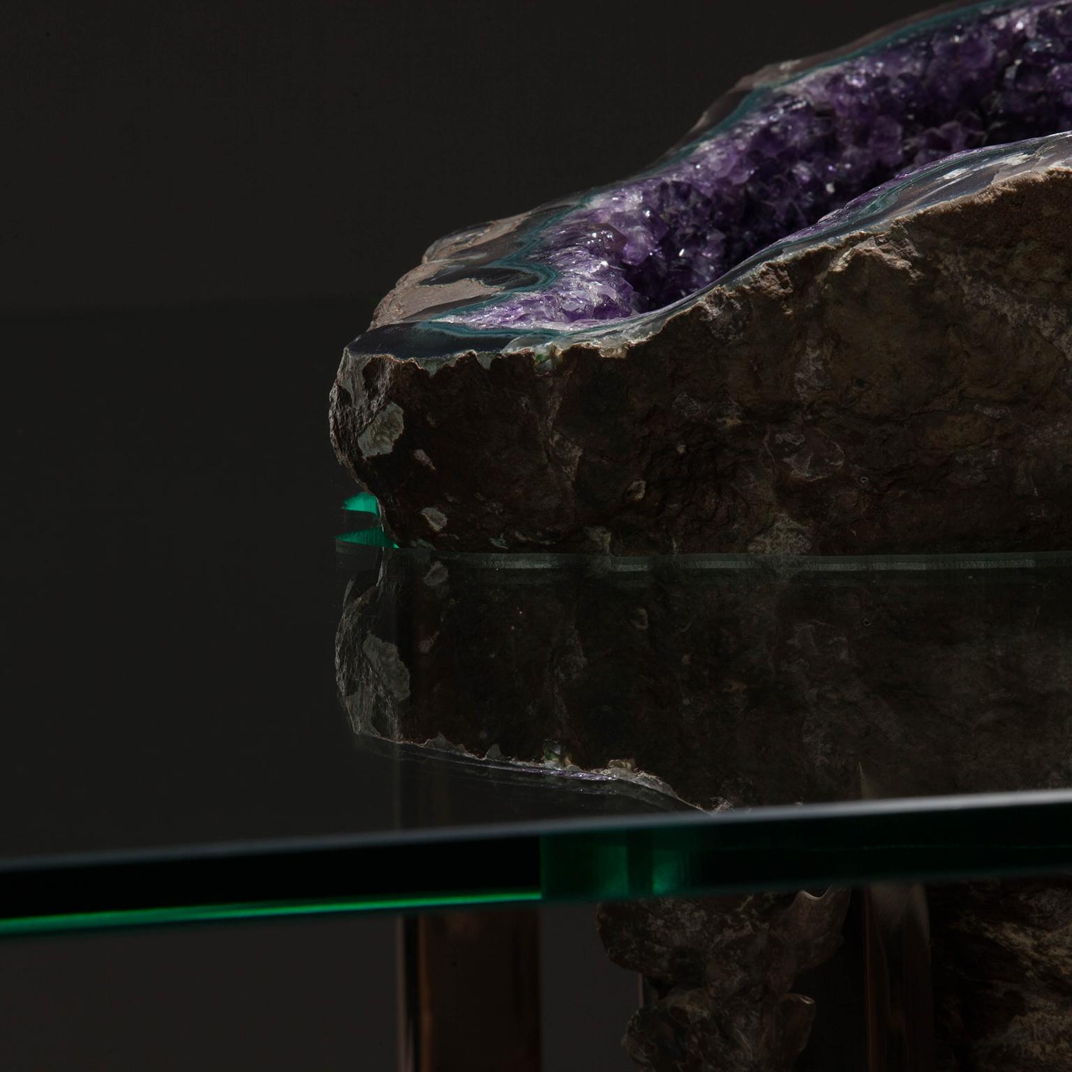 ICEBERG TABLE 1

Studio Greytak pays homage to unseen depths of spirituality with Iceberg Table 1. A rich violet amethyst, the gem revered for eons by those seeking enlightenment, sparkles in a sea of glass. From above, its deep cavern displays