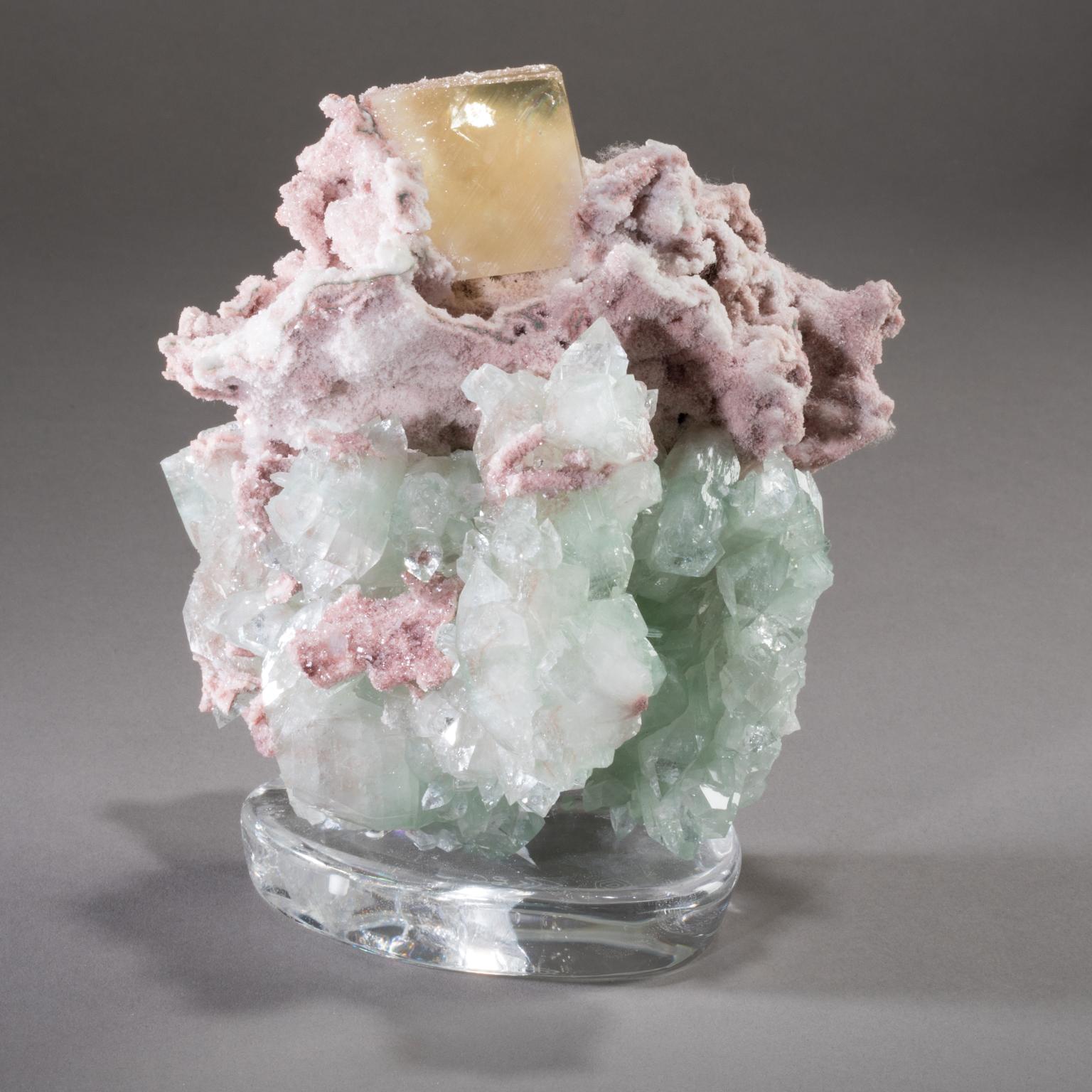 STILBITE, CALCITE, AND APOPHYLLITE ON CRYSTAL BASE

Studio Greytak’s Stilbite, Calcite, and Apophyllite on Crystal Base is a trio of Norse matronae, mythical goddesses sent to provide comfort, protection, and peace. A soft bed of blue apophyllite