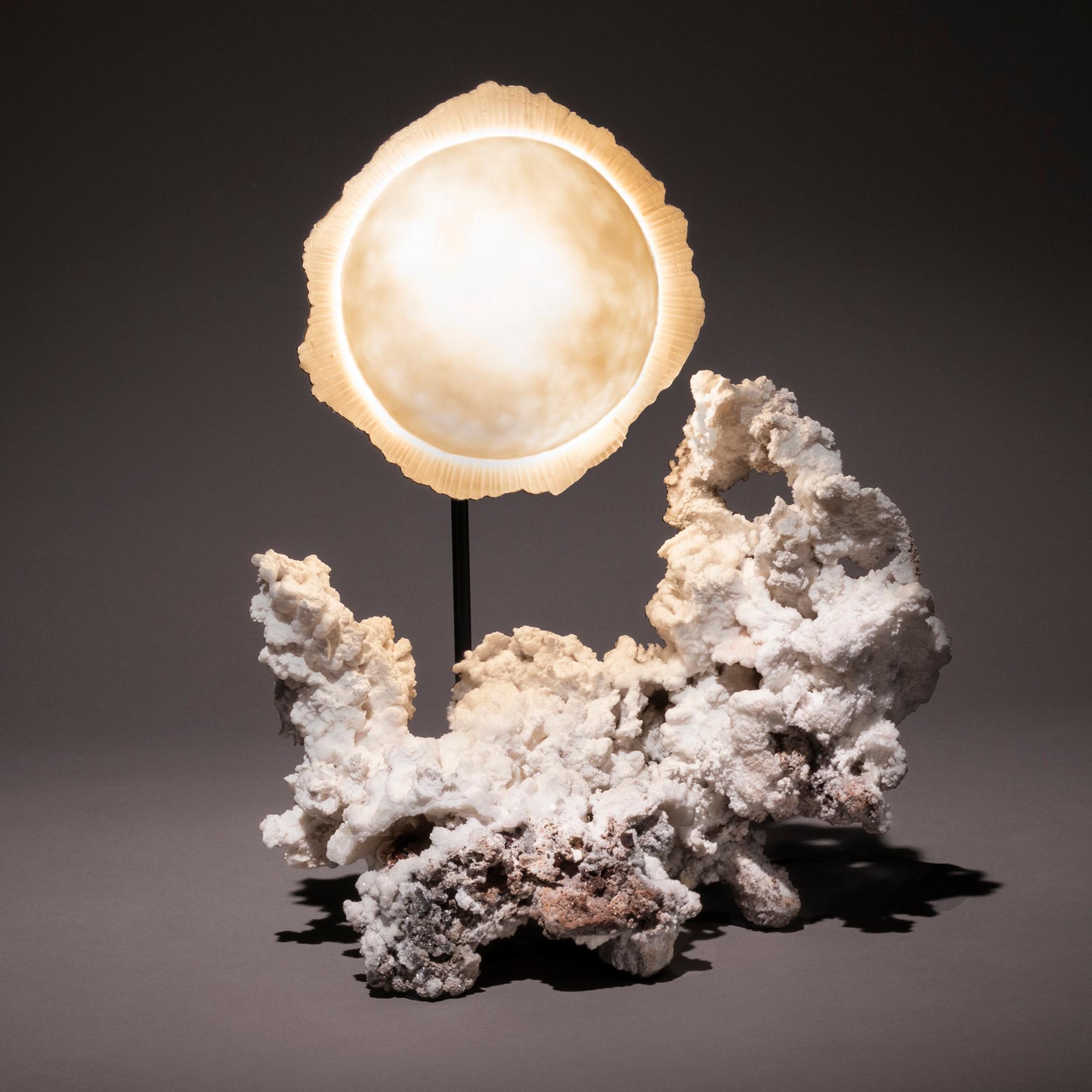 When the Sun sinks below the horizon, and the day’s work is done, the sky becomes a stage for the Moon in whatever form she chooses—a full and luminous, a delicate sliver, or no form at all. Studio Greytak embraces the enigma of the Moon’s