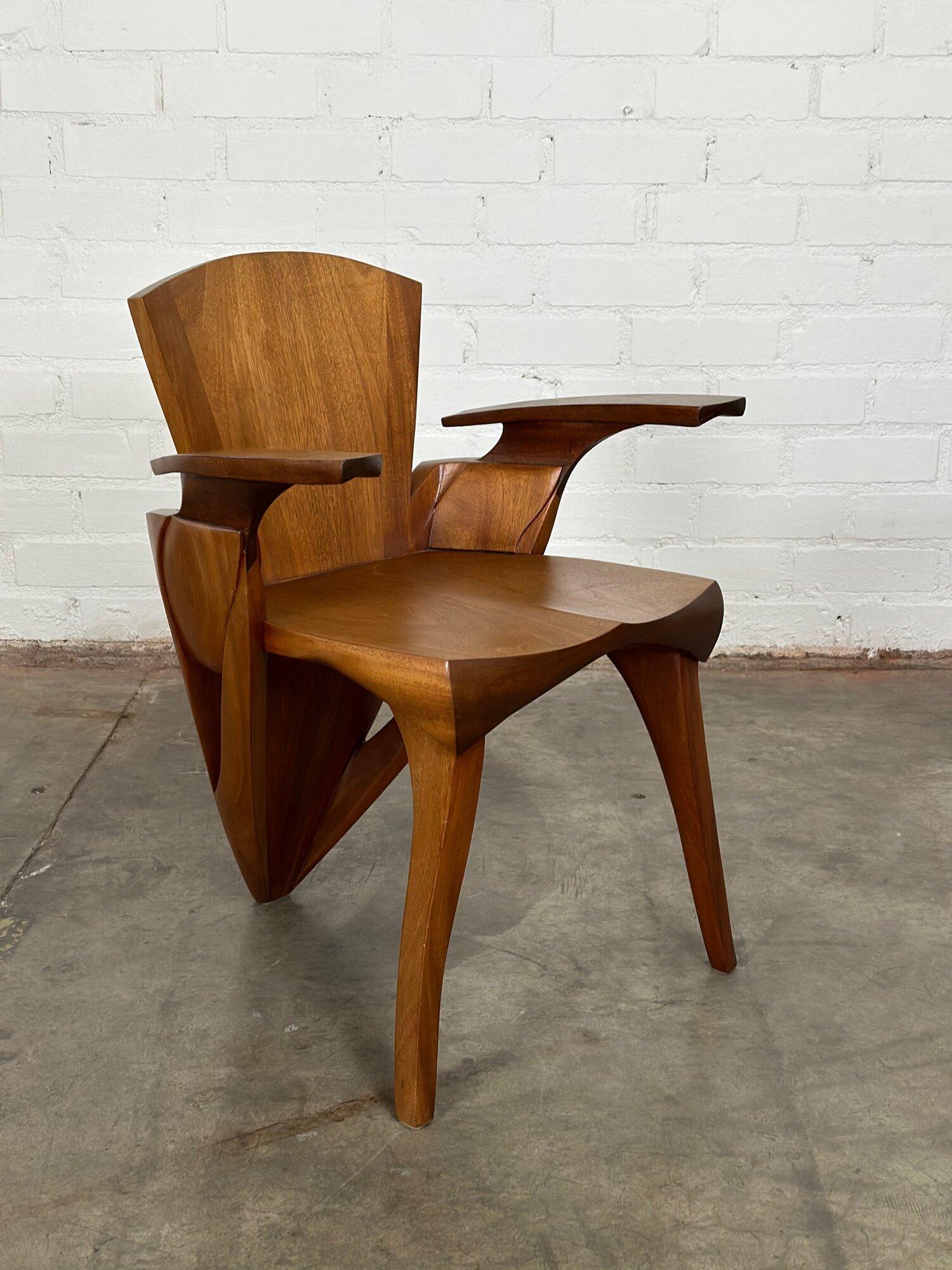 W25 D25 H31 SW18 SD17 SH18 AH25

Exceptionally made pair of sculptural side chairs in solid wood. Chairs have been fully restored and inspected by our in house carpenters. Both chairs are sturdy and structurally sound.