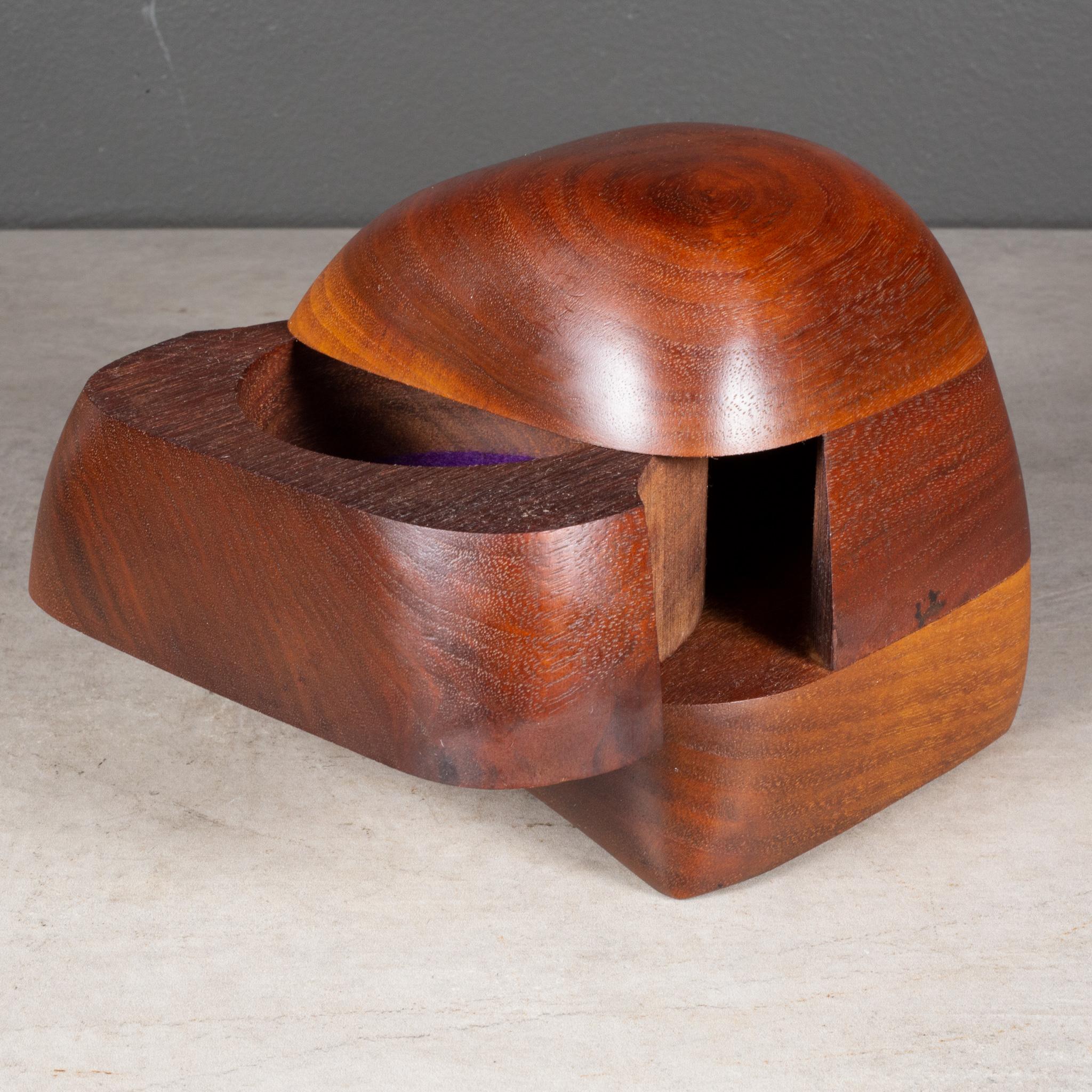 ABOUT

Original studio, handcrafted wood jewelry box by California woodworker, Dean Santner. Expertly crafted in walnut. Pull out center drawer lined in purple felt.

    CREATOR Dean Santner, Berkeley, CA.
    DATE OF MANUFACTURE c.1970.
   