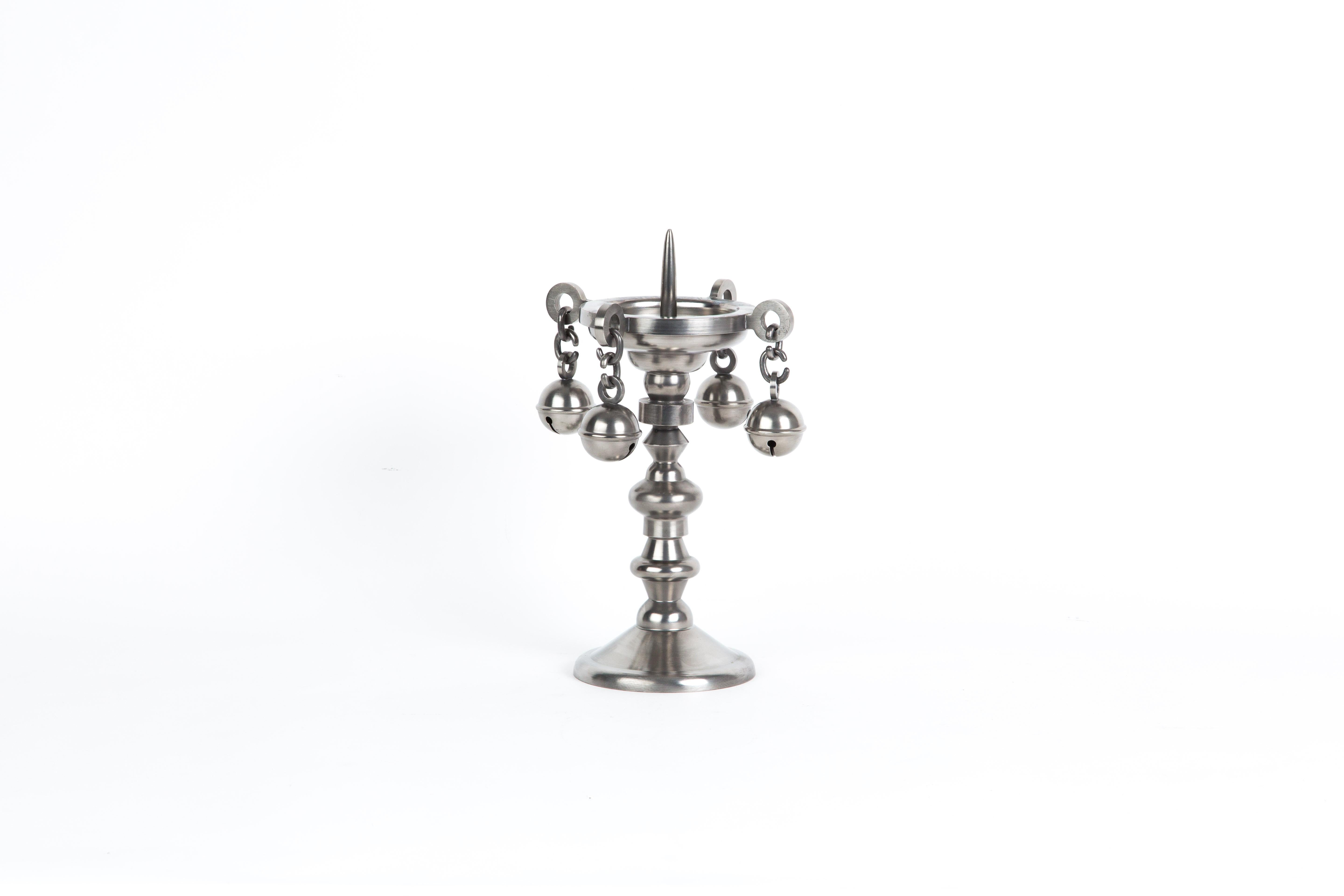 This candle holder is made of pewter. It is massive thus heavy.  Limited edition of Studio Job. Numbered 127/150 . 