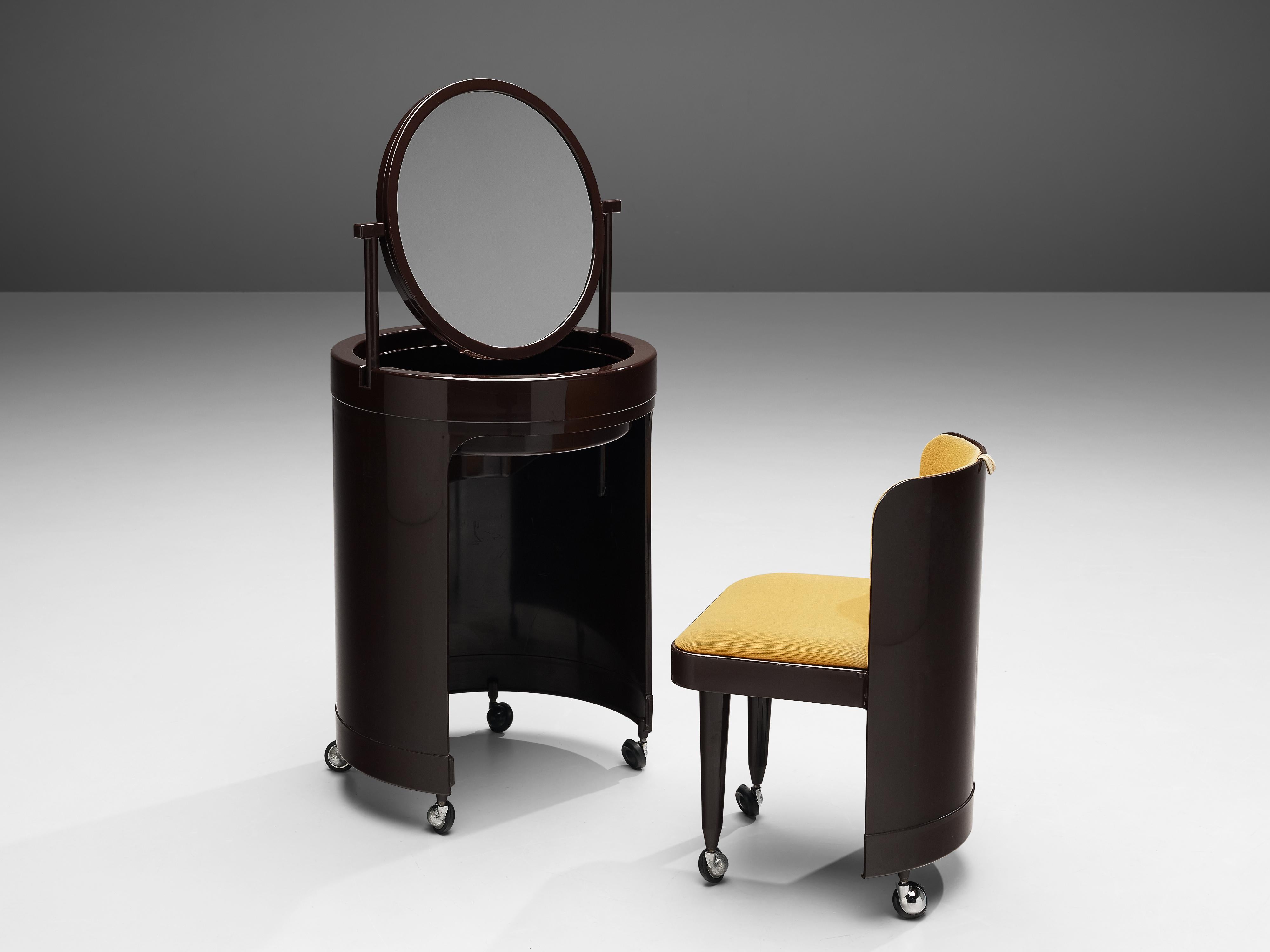 Studio Kastilia, ‘Silvi’ vanity table with chair, plastic, glass, metal, fabric upholstery, Spain, 1970s

This lovely vanity table with chair transforms into a side table when not in use. The cylindrical shape on wheels actually features a small