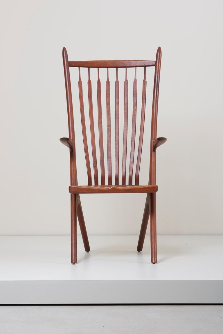 Custom, handmade armchair designed by Richard Harrison. This remarkable, lightweight and sculptural chair is made of walnut. The chair has beautiful connections and is in excellent condition.
R. Harrison was also published in the famous FINE